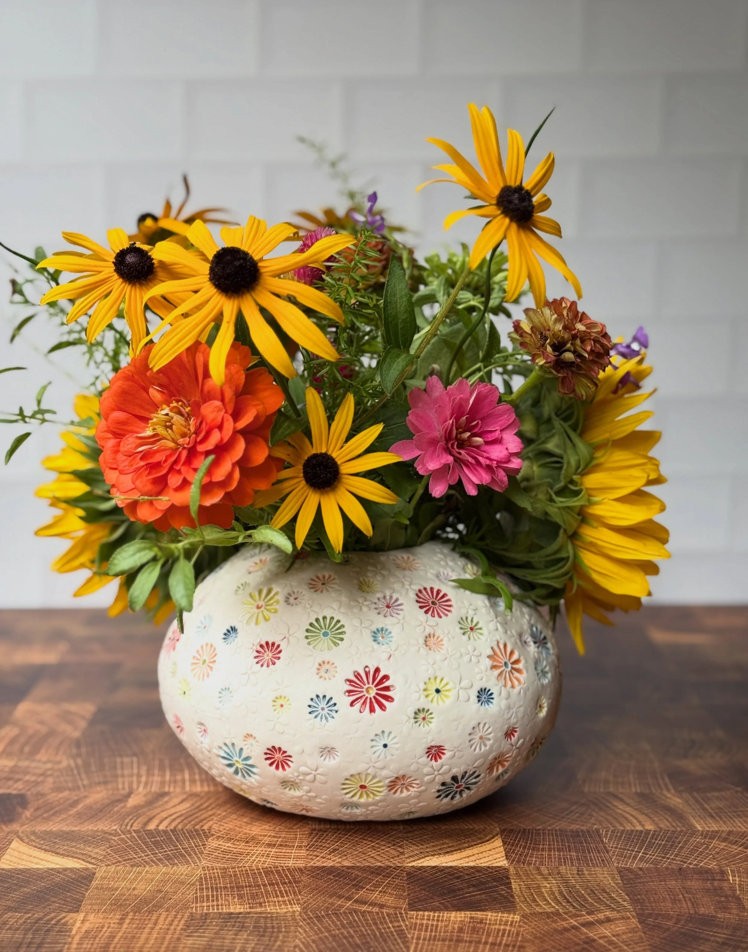 This orb shape is a new one for me, and I am definitely a fan!  What do you think?  This vase and a couple of others are still available in the shop&mdash;along with berry bowls, wine cups, budvases, and mugs!  Oh my!  Go get yourself some colorful, 