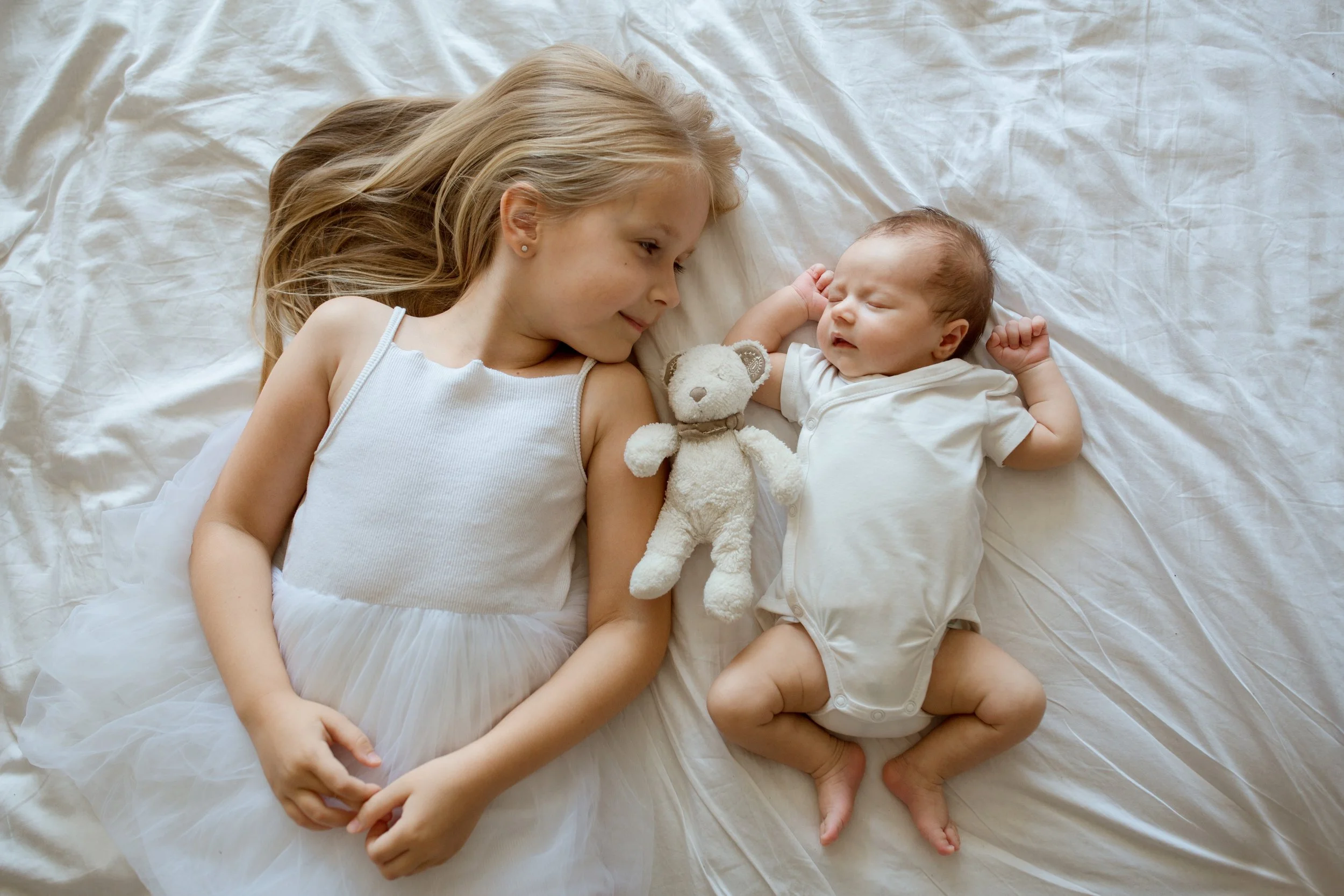 little-sister-and-her-newborn-brother-toddler-kid-2024-11-07-13-25-41-utc.jpg