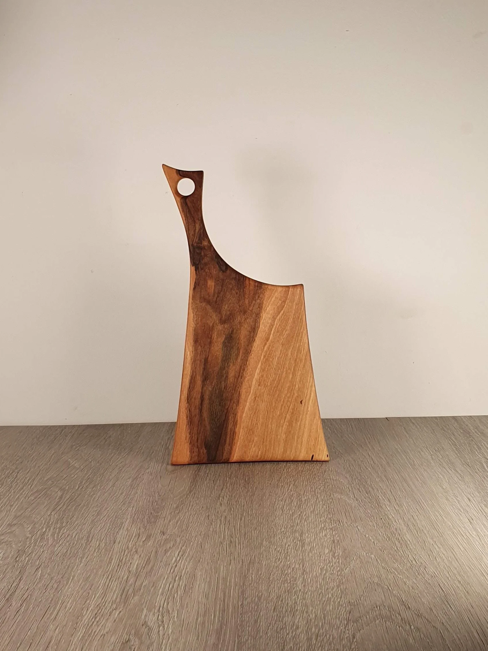A handmade wooden cutting board.