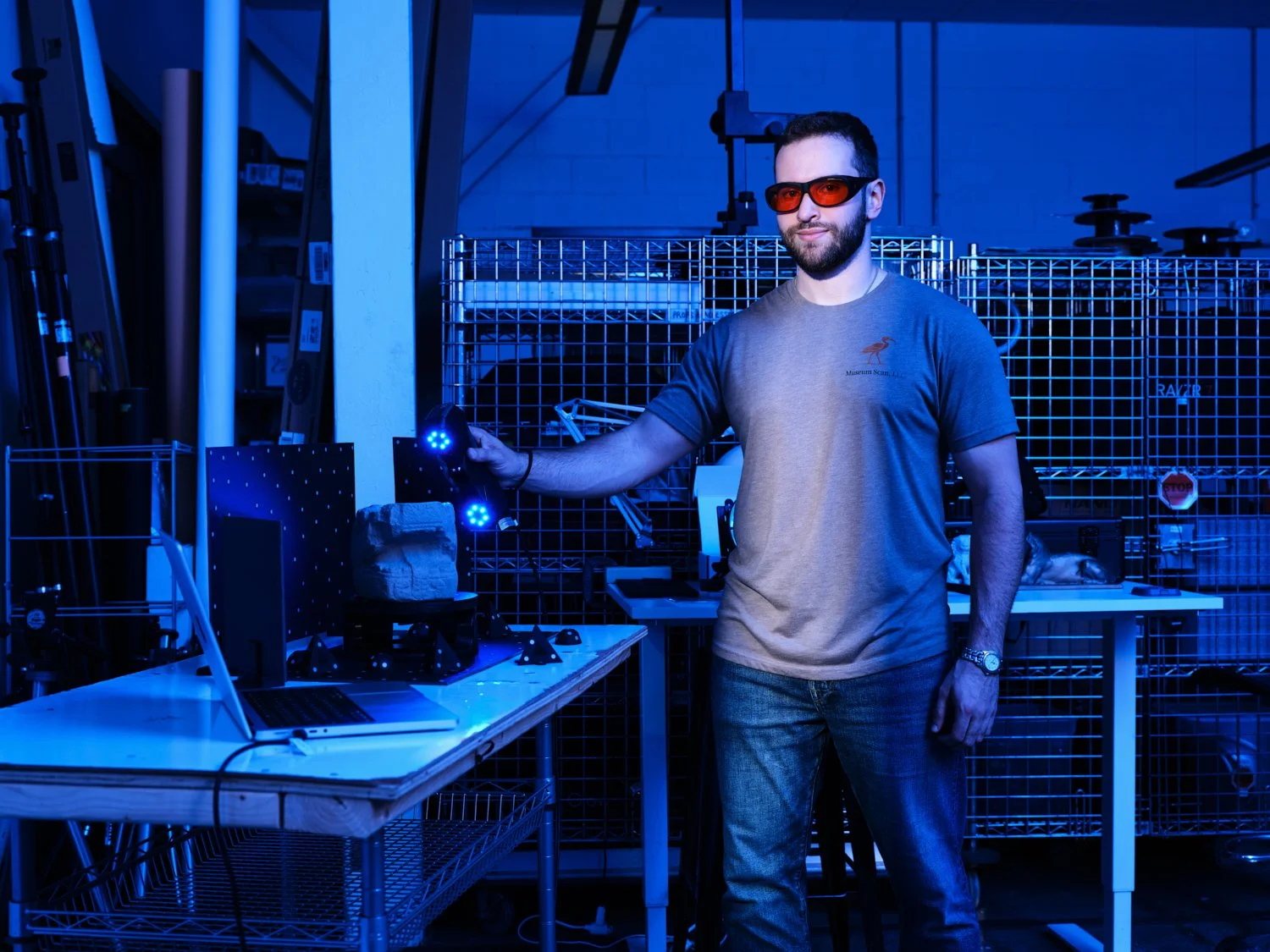 Portrait of Jack, founder of Museum Scan. He is scanning a snake head for a photography personal work series