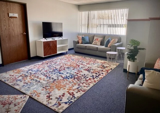 A warm, private seating area in the office