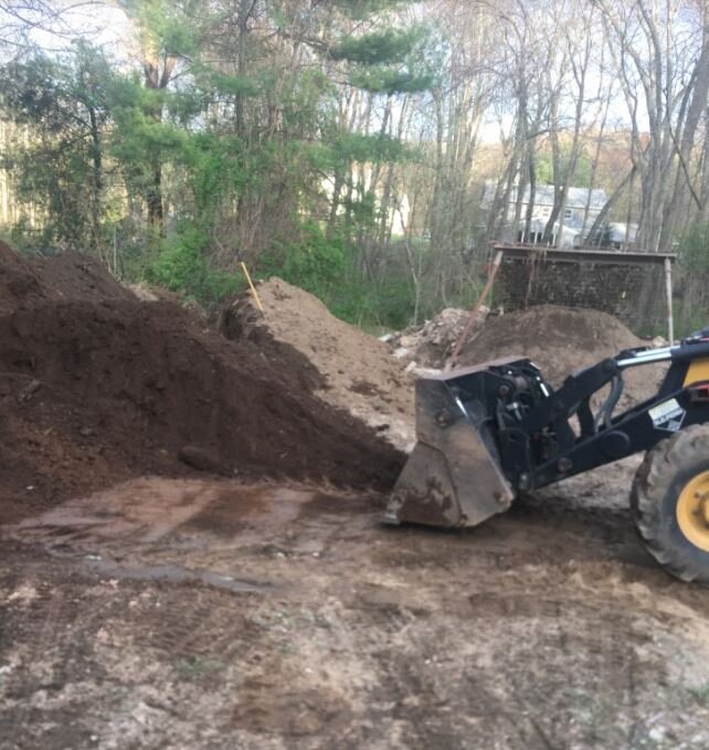 MovingTopSoil.JPG