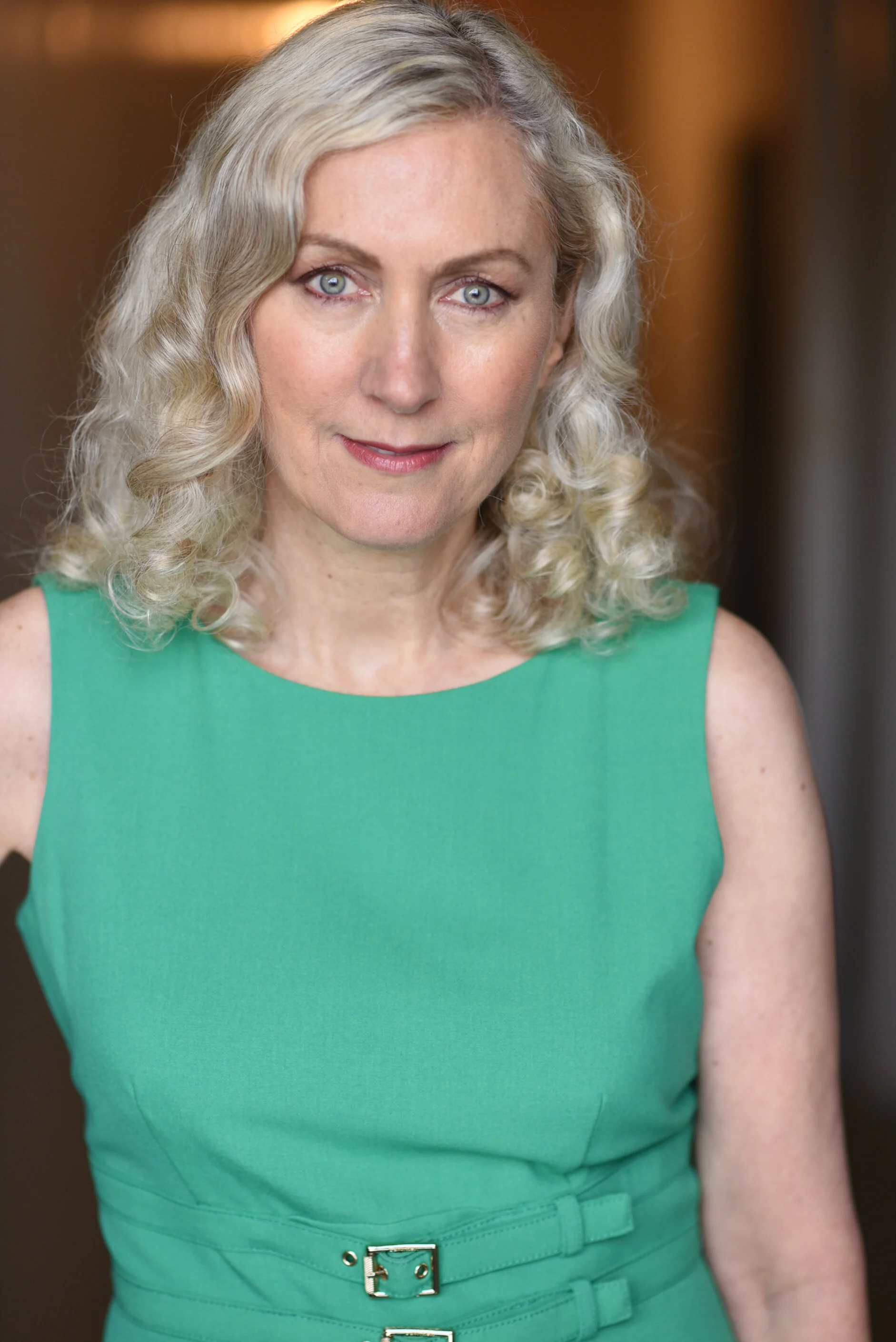 Stacia Square Space Head Shot Green Dress (1).jpg