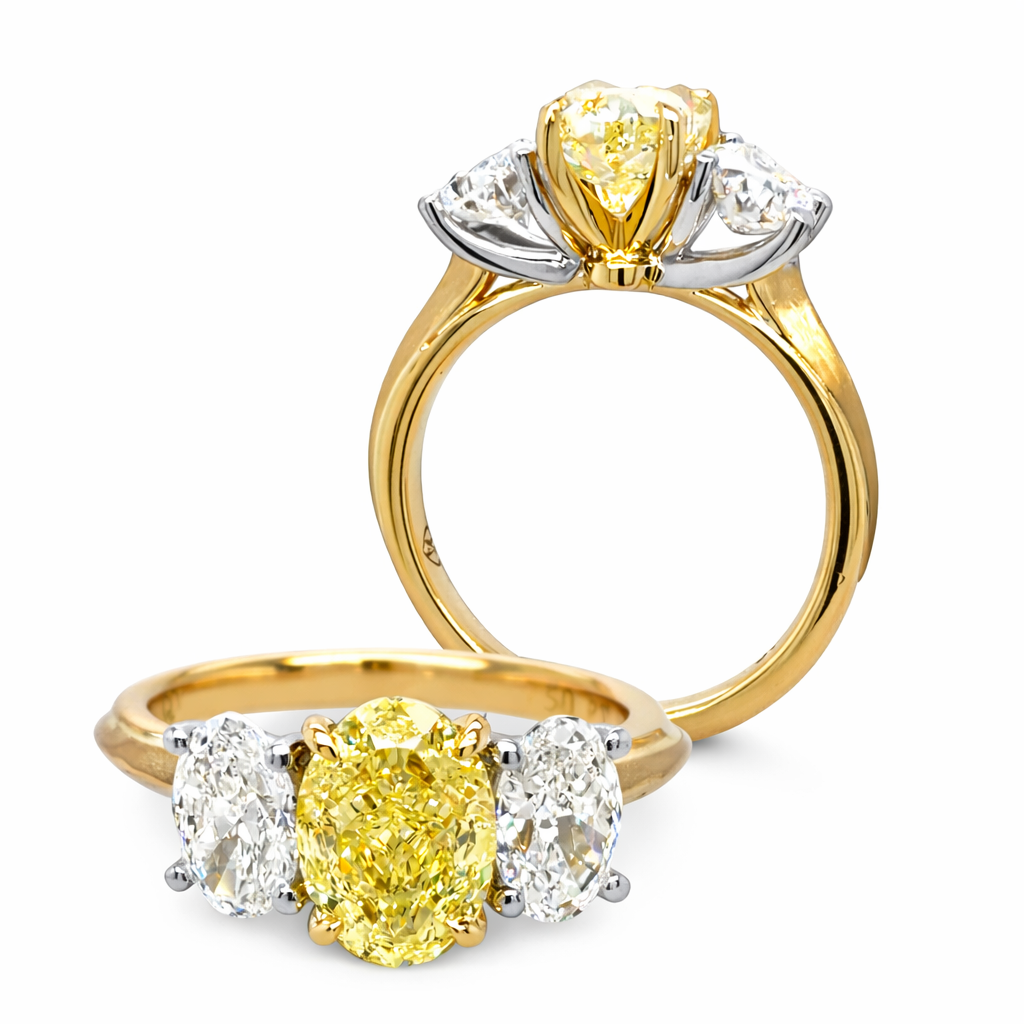 Yellow and white natural diamond trilogy style engagement ring. Engagement ring crafted in 18ct. yellow gold, made in Australia. Sydney based jeweller specialising in high end bespoke handcrafted jewellery.