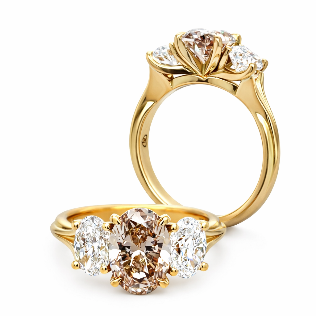 Champagne diamond and white natural diamond trilogy style engagement ring. Engagement ring crafted in 18ct. yellow gold, made in Australia. Sydney based jeweller specialising in high end bespoke handcrafted jewellery.


