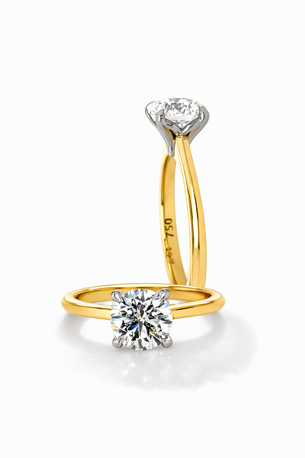 Two gold natural diamond engagement rings with round brilliant cut solitaire design designed and crafted in Sydney Australia.