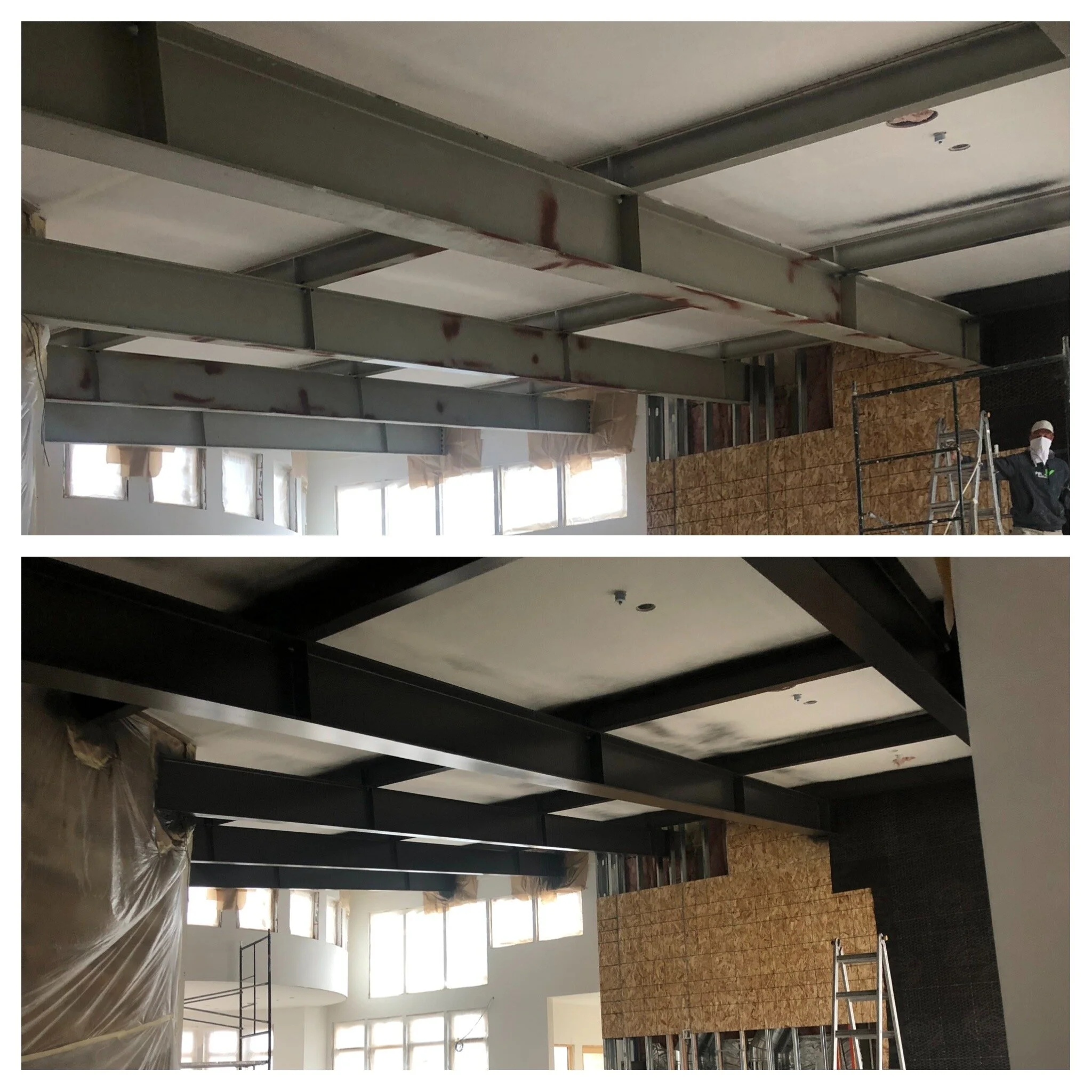 Construction site interior with partially installed walls, steel beams, and equipment, and a worker wearing a mask.
