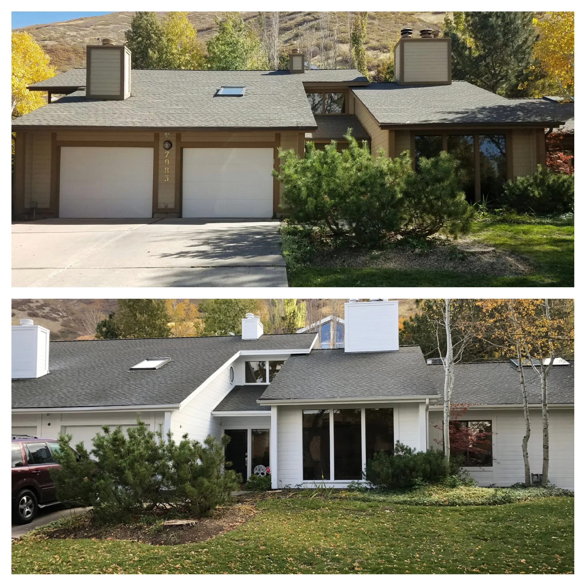A two-story house with a front porch, attached garage, multiple chimneys, skylights, and a mountain background with trees in fall colors.