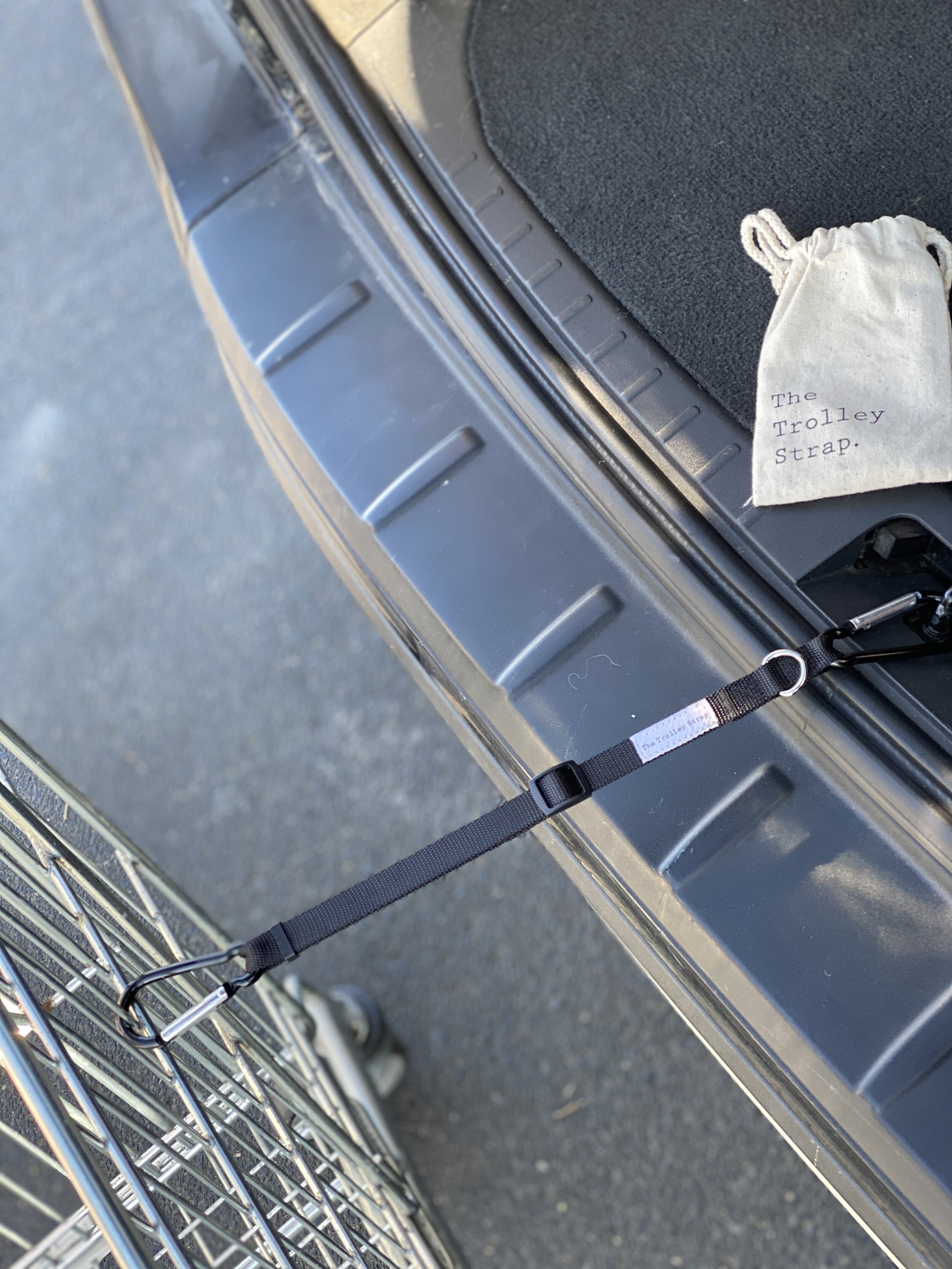 THE TROLLEY STRAP