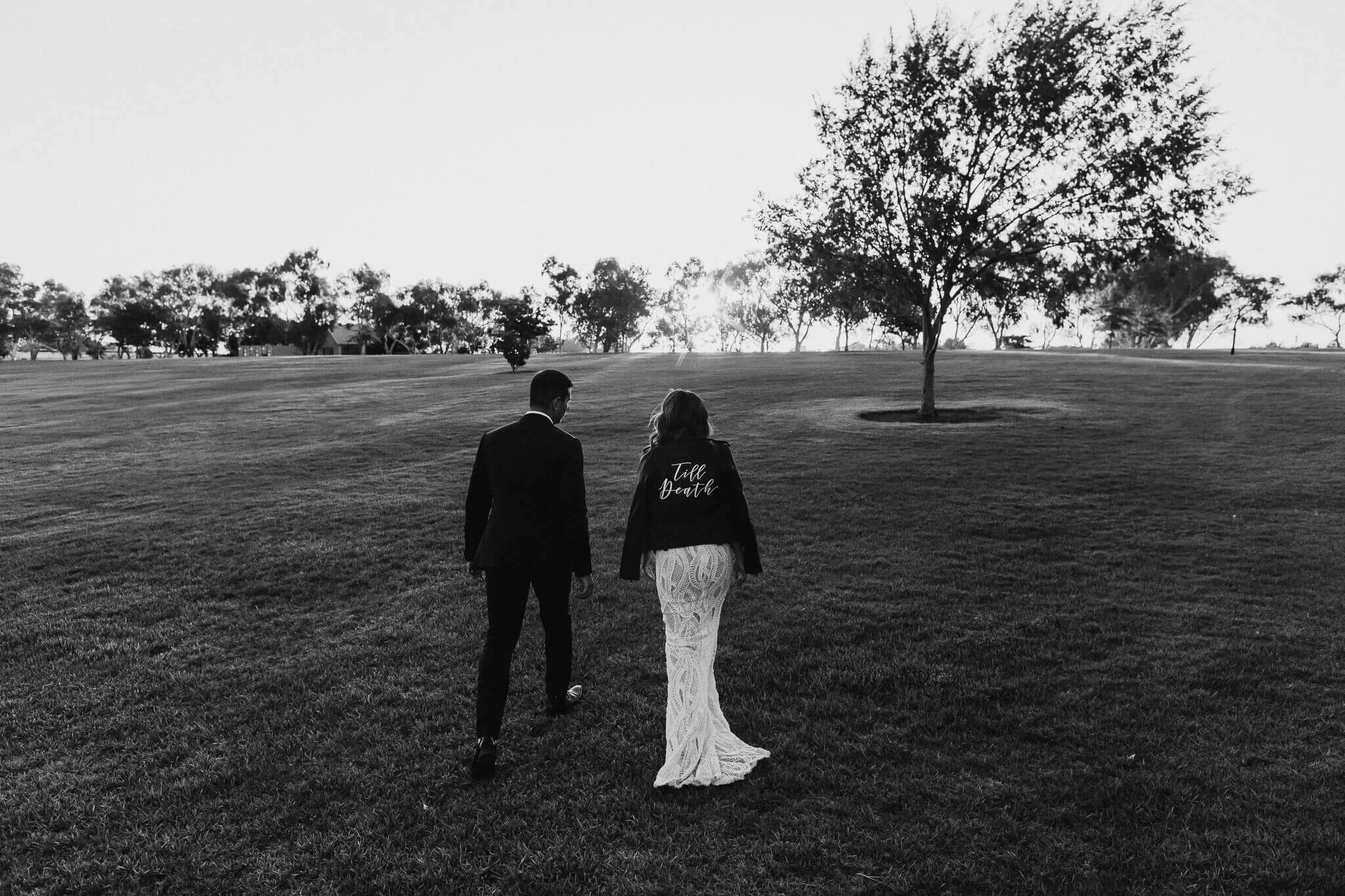 Bride and groom strolling