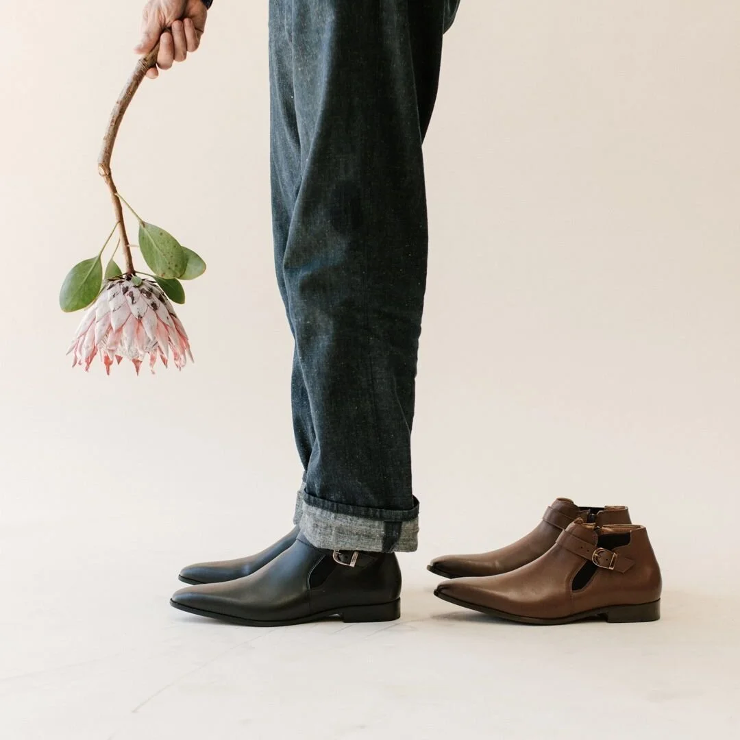 Want the perfect blend of a boot and a dress shoe? Take a look at Archer's sleek and classic design, that features a strap with a decorative buckle, an elasticised side &amp; inner zip, for getting on with ease. 

They're perfectly versatile and comf