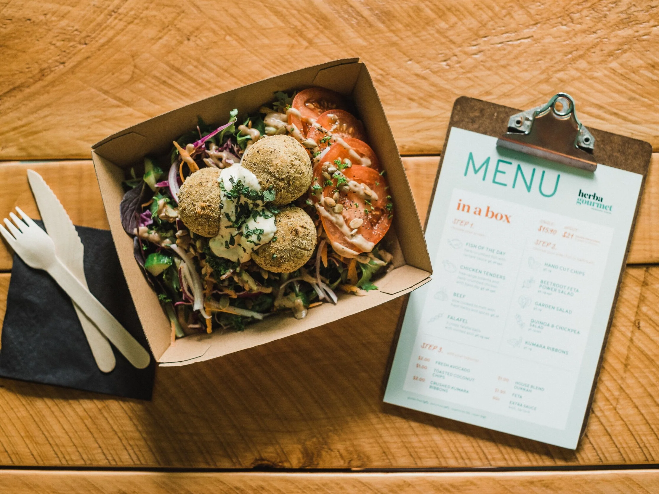 Herba Gourmet  Hi we are herba, we make food. Wholesome, honest food.   Whether it’s crumbed, fried, spiced or slow cooked to melt, and sat on a fresh, crisp or grainy bed, it’s a box of nutrient-rich, tasty goodness; and you can bet a side of our crispy kumara ribbons that it’s gluten, sugar and dairy-free — it’s just how we cook.