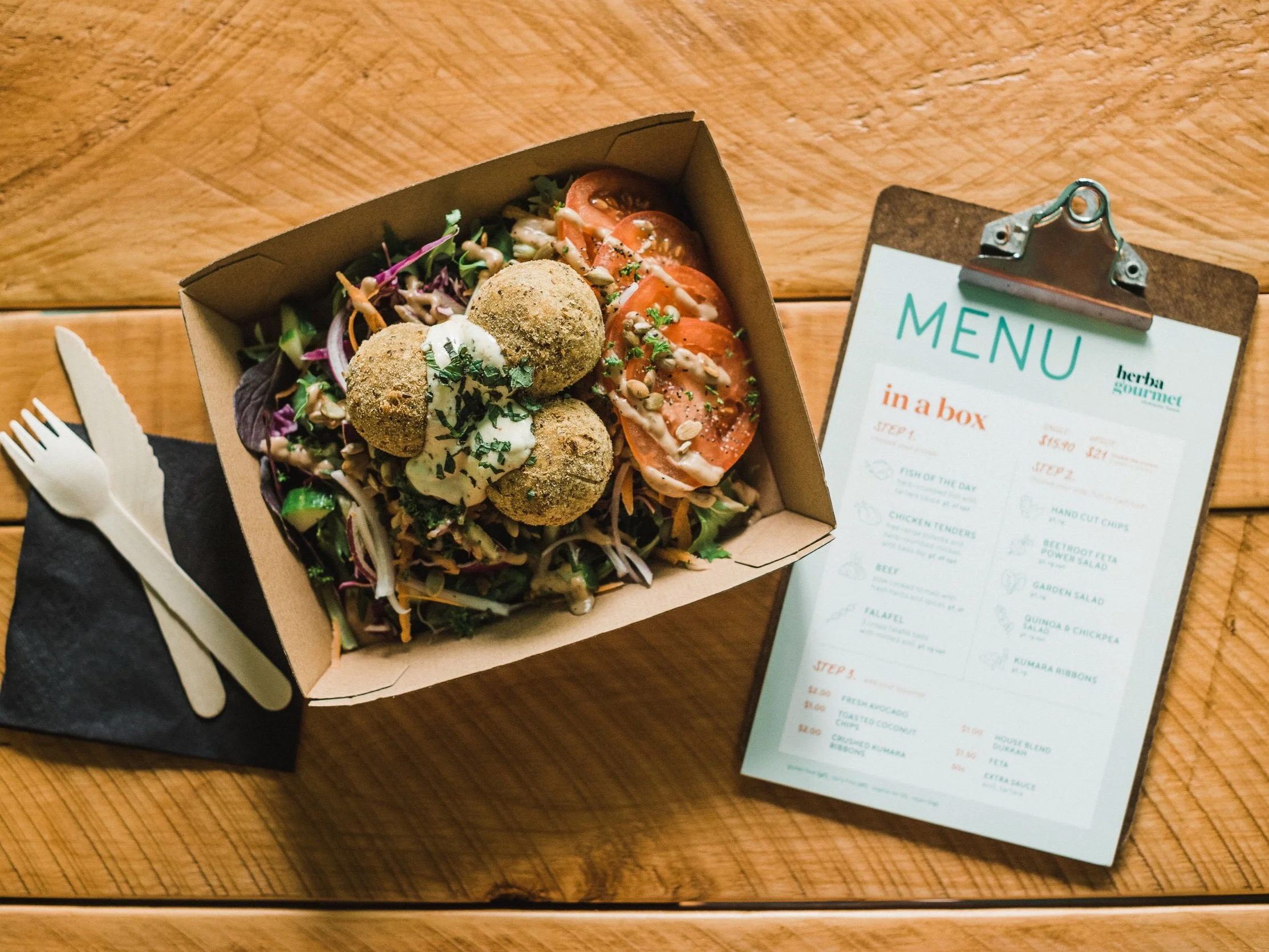 Herba Gourmet  Hi we are herba, we make food. Wholesome, honest food.   Whether it’s crumbed, fried, spiced or slow cooked to melt, and sat on a fresh, crisp or grainy bed, it’s a box of nutrient-rich, tasty goodness; and you can bet a side of our crispy kumara ribbons that it’s gluten, sugar and dairy-free — it’s just how we cook.