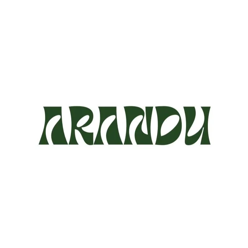 Stylized dark green “ARCADIU” logo on a white background