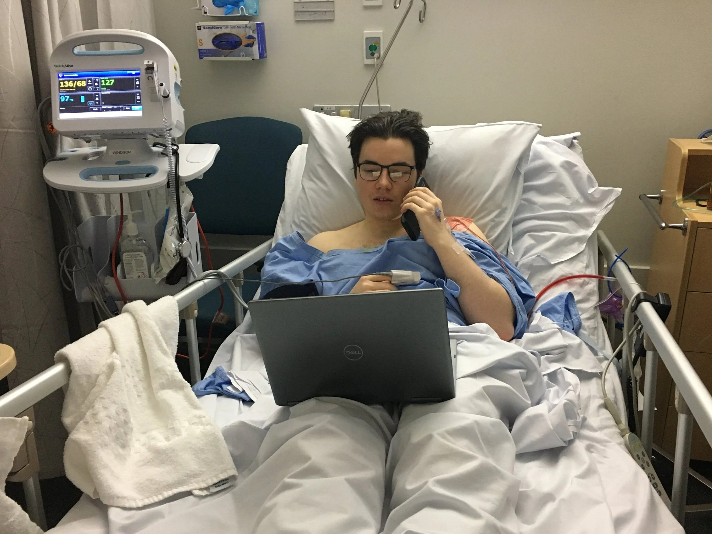 Founder and Managing Director, Ryan Brigham, organizing a medical camp whilst hospitalized.