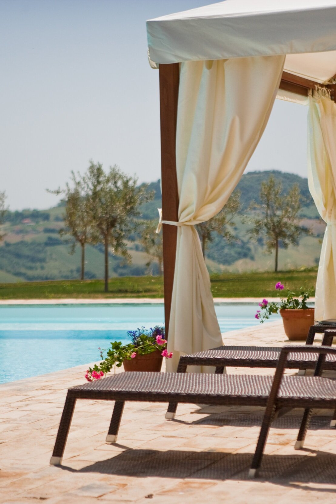 Sun lounger by pool