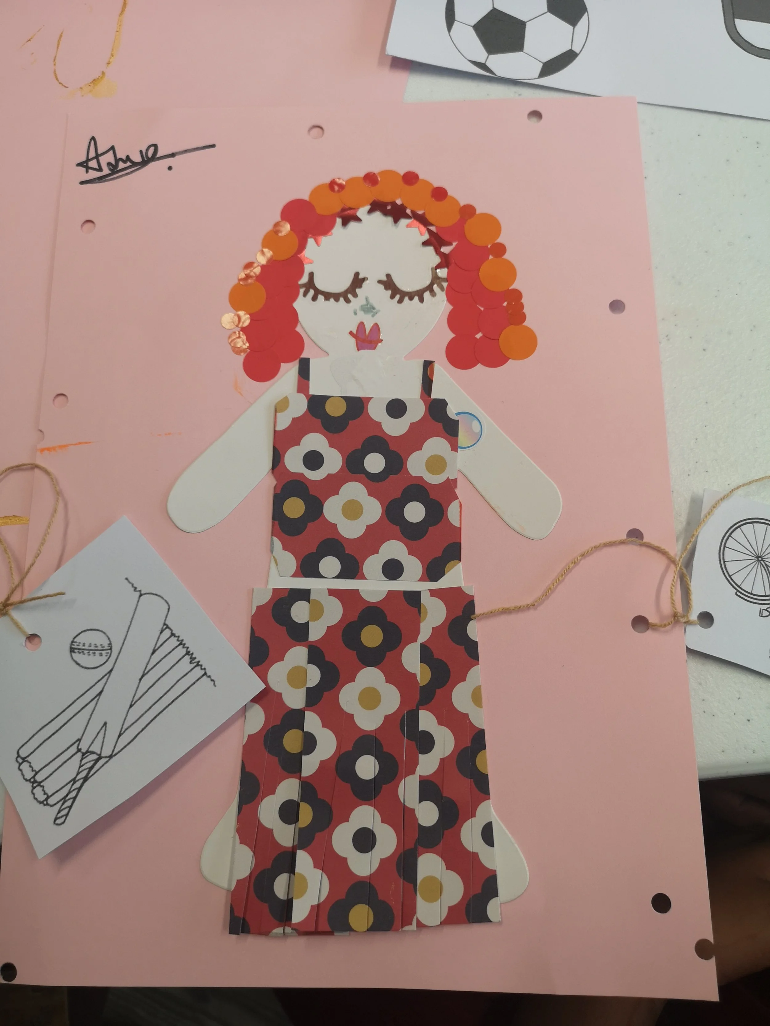 A anon on a peach background with red hair with eyes shut and a patterned dress.
