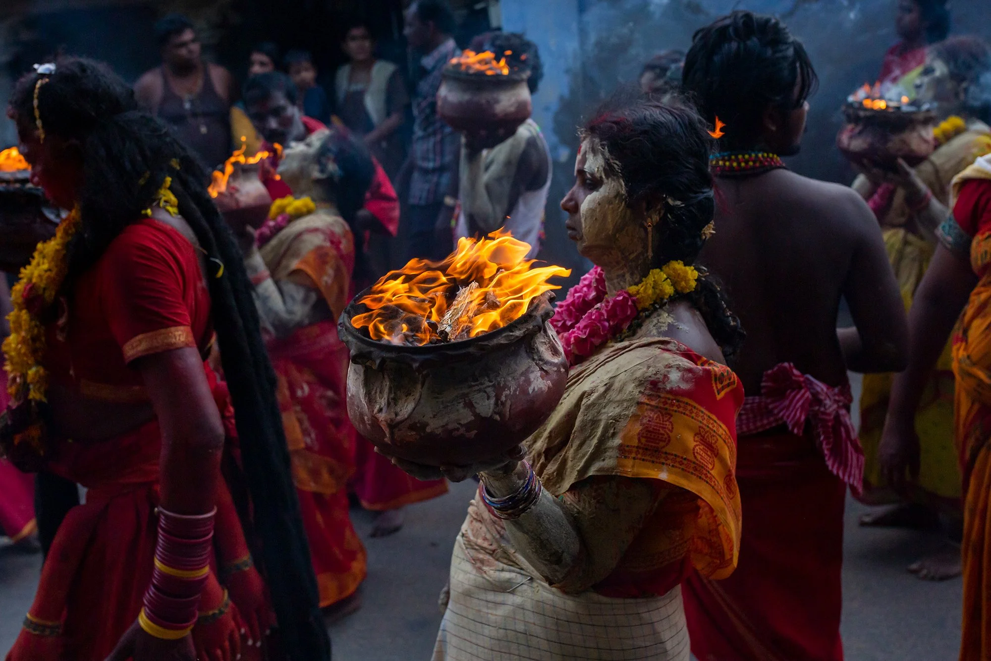 Woman Carrying Fire