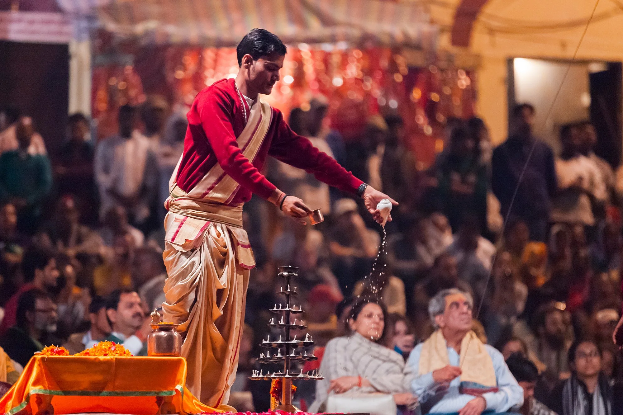 At the Ganga Aarti

One of the priests leading the evening Ganga Aarti at Dashashwamedh Ghat, Varanasi, a daily ceremony of light, prayer, and devotion on the banks of the Ganges.
