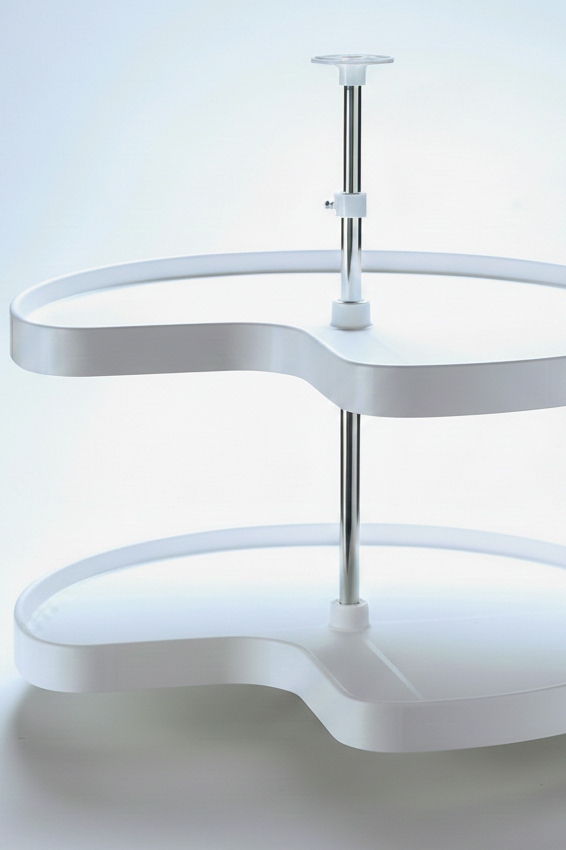 A white lazy susan mechanism for corner cabinets.