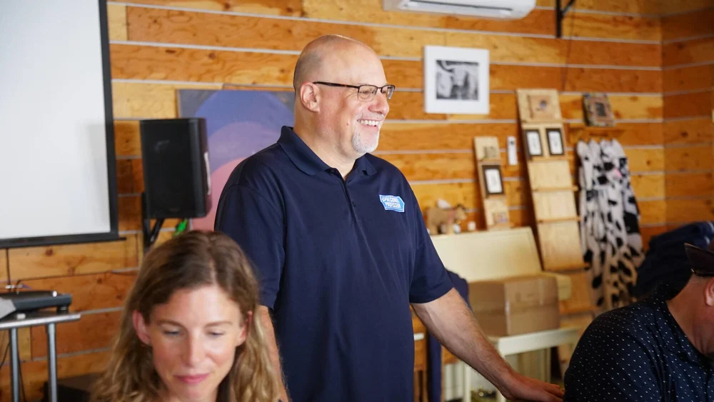 Adam Levy greets the judges