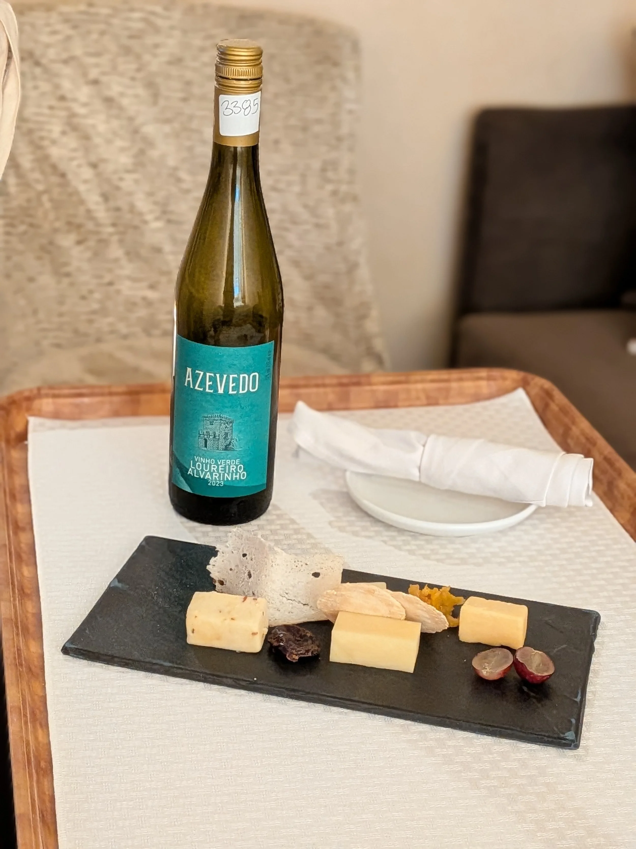 Gouda, Emmental, and Brie on a room service cheese plate