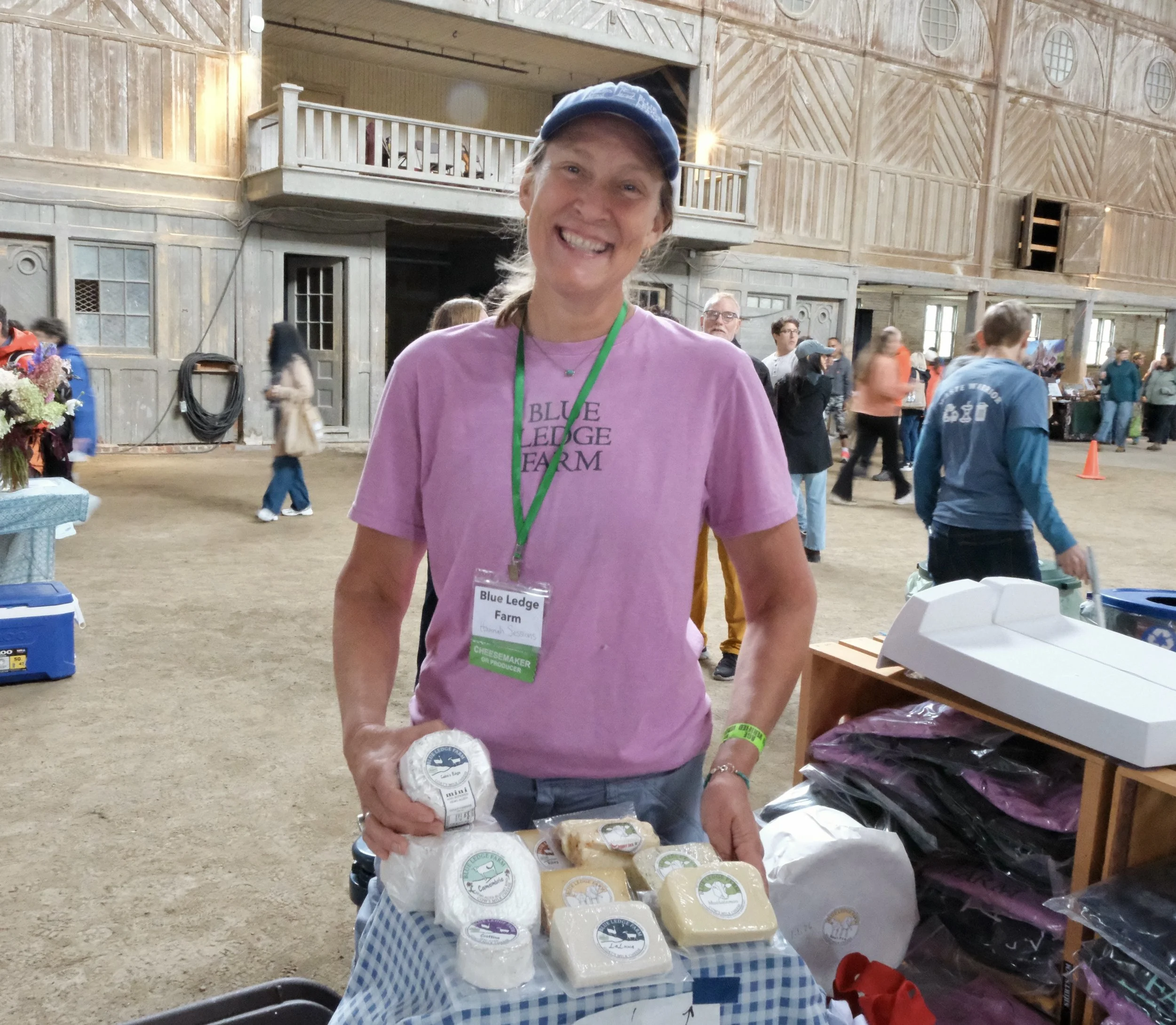 Hannah Sessions of Blue Ledge Farm with cheeses