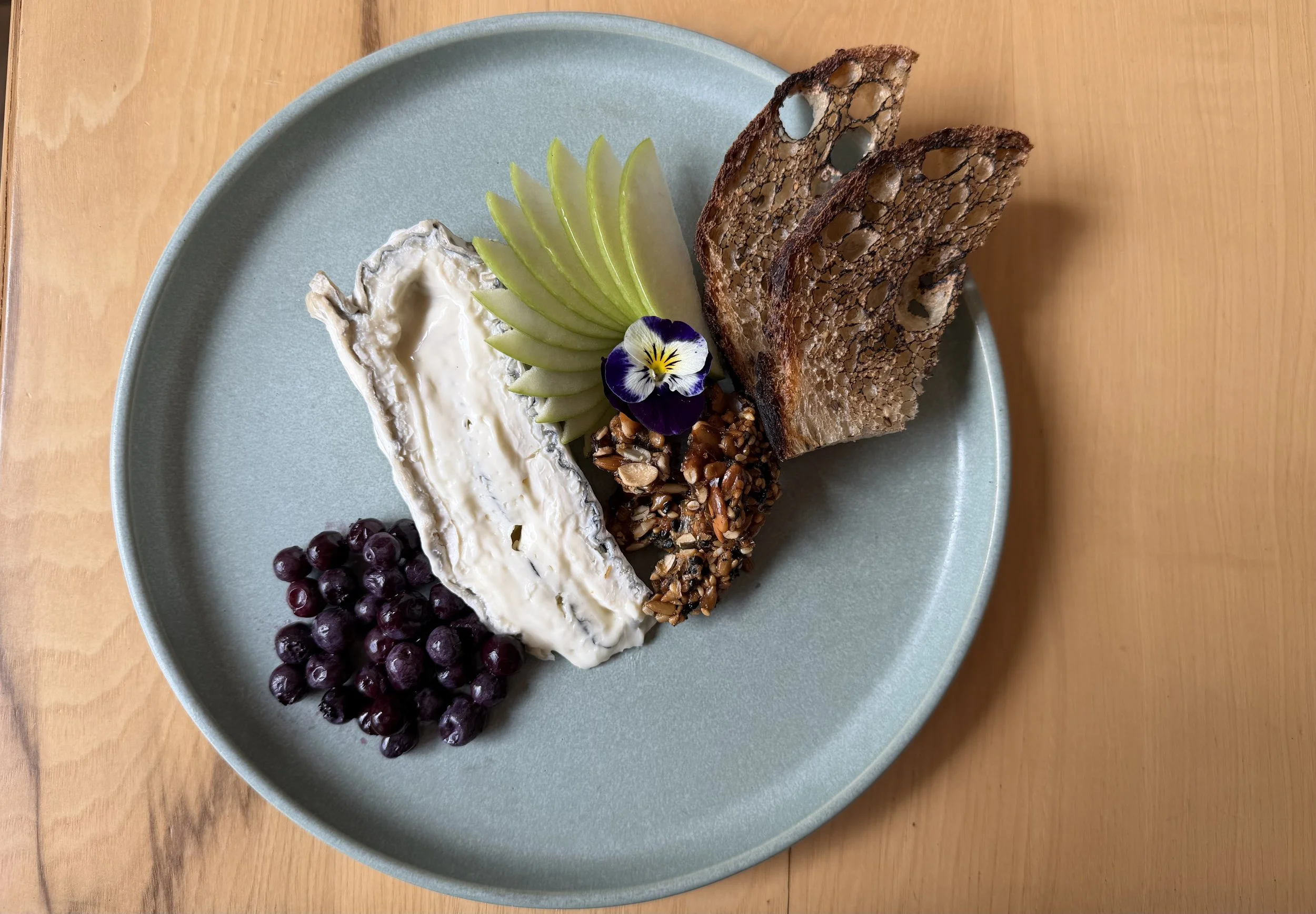 minimalist cheese plate featuring Blakesville Creamery Linedeline