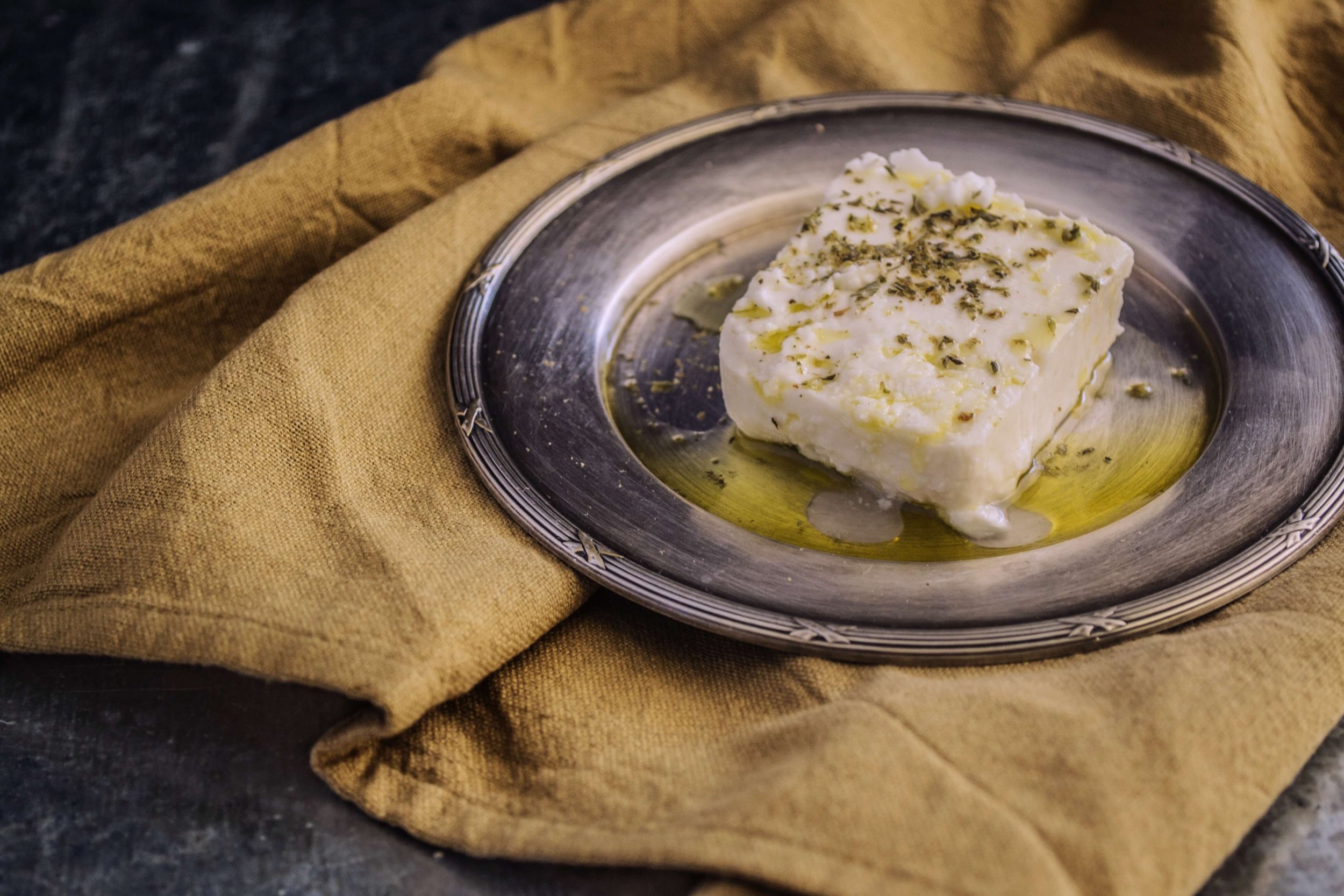Cheese replica Parmesan Reggiano, with dish