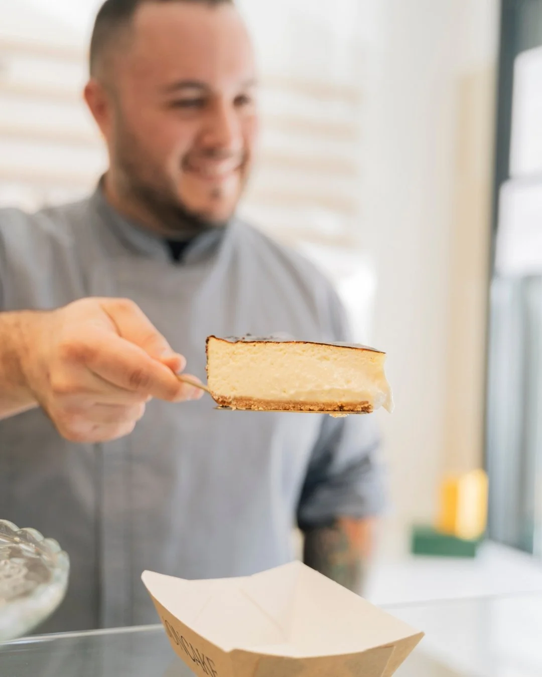 Jon García with slice of cheesecake