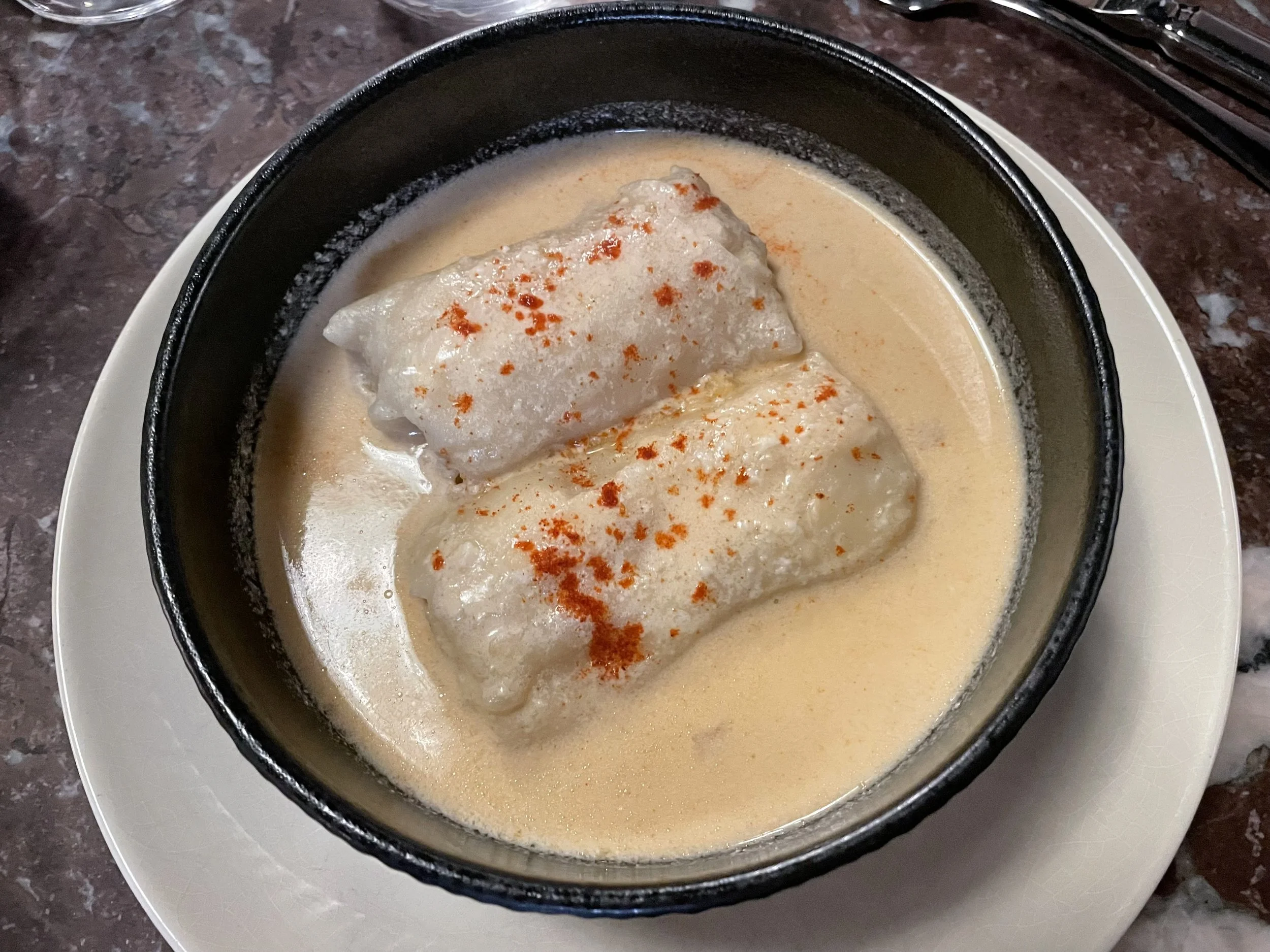 Boiled štrukli served with savory sauce