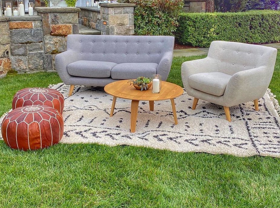 This lounge decor setup is comfy, cozy, and Instagrammable for your guests to enjoy ☺️ ⠀
⠀
Our rentals: Grey Fabric Heather Loveseat &bull; Beige Fabric Heather Armchair &bull; Round Natural Wood Coffee Table &bull; Brown Leather Moroccan Pouf ⠀
⠀
Or