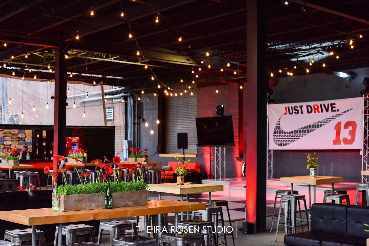 Let's get down to Business✔️ Great setup for this #mitzvah with @carrieherman2 @theirarosenstudio at RPM Raceway 🏎🏁 ⠀
⠀ ⠀ ⠀
Our rentals: Black Chesterfield Sofas &bull; Red Fabric Vintage Loveseats &bull; Bistro Lighting &bull; Rustic Pipe Leg Comm