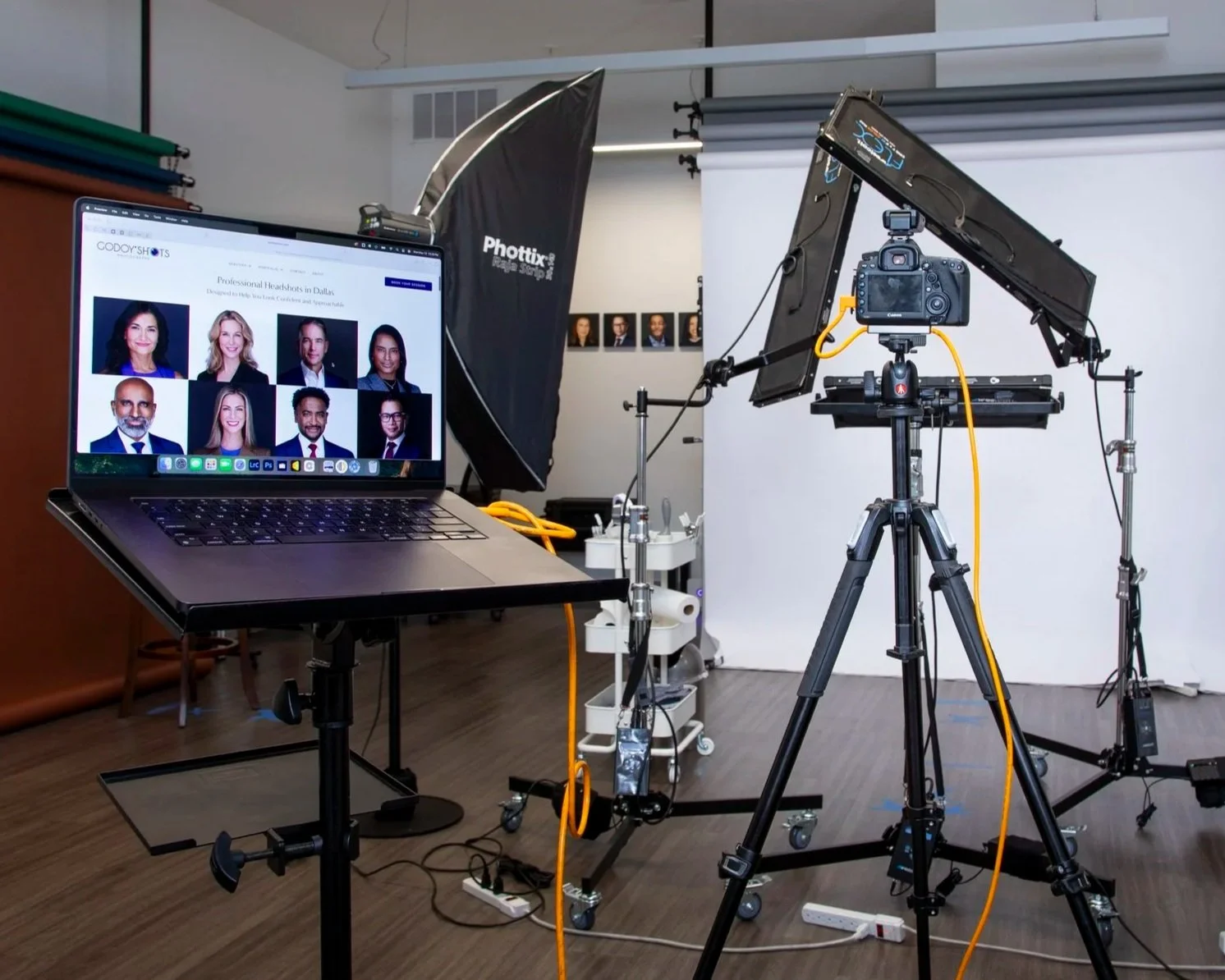 Camera, lighting, and tethered laptop setup at the Godoy Shots headshot studio.