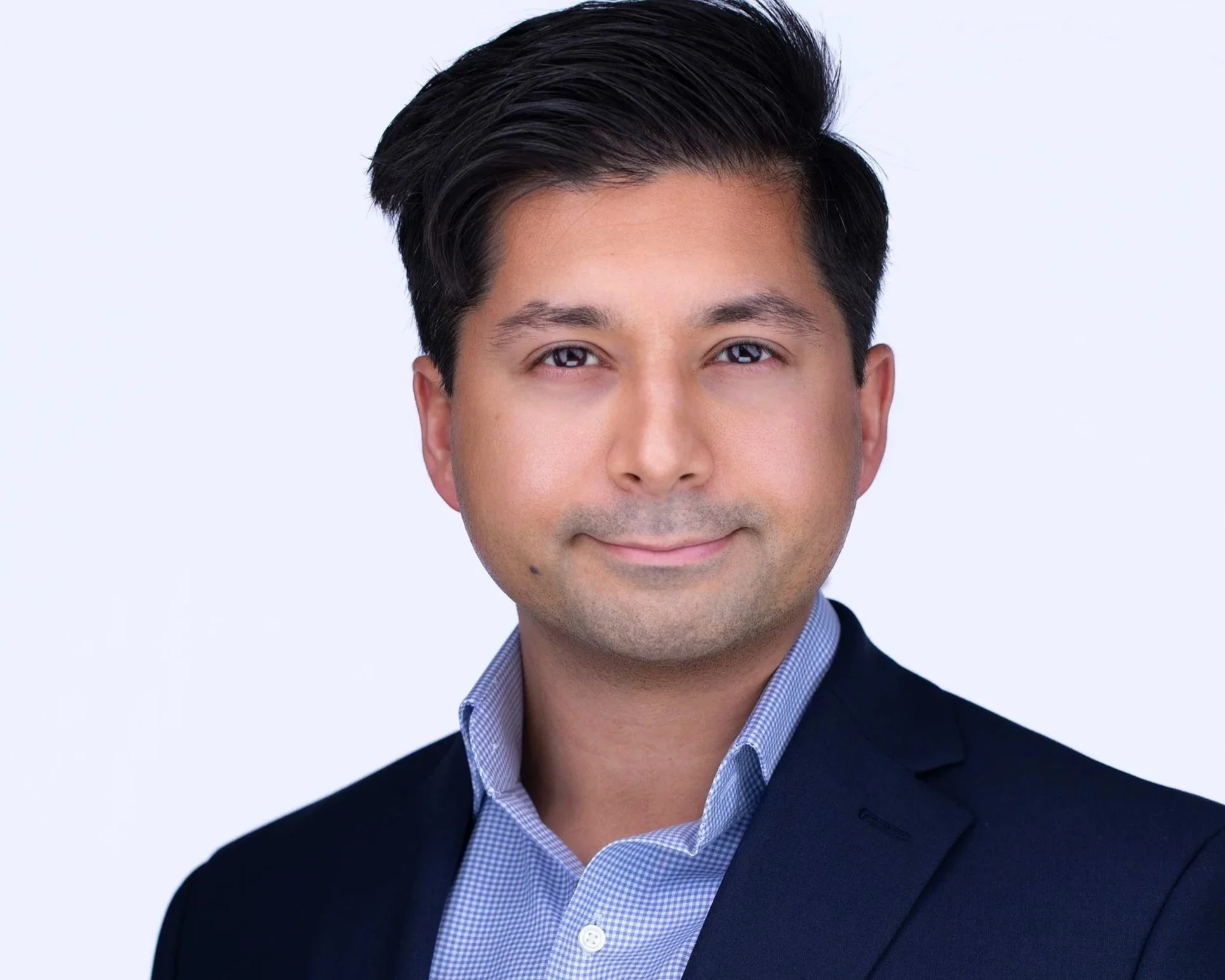 Corporate professional portrait with polished natural expression