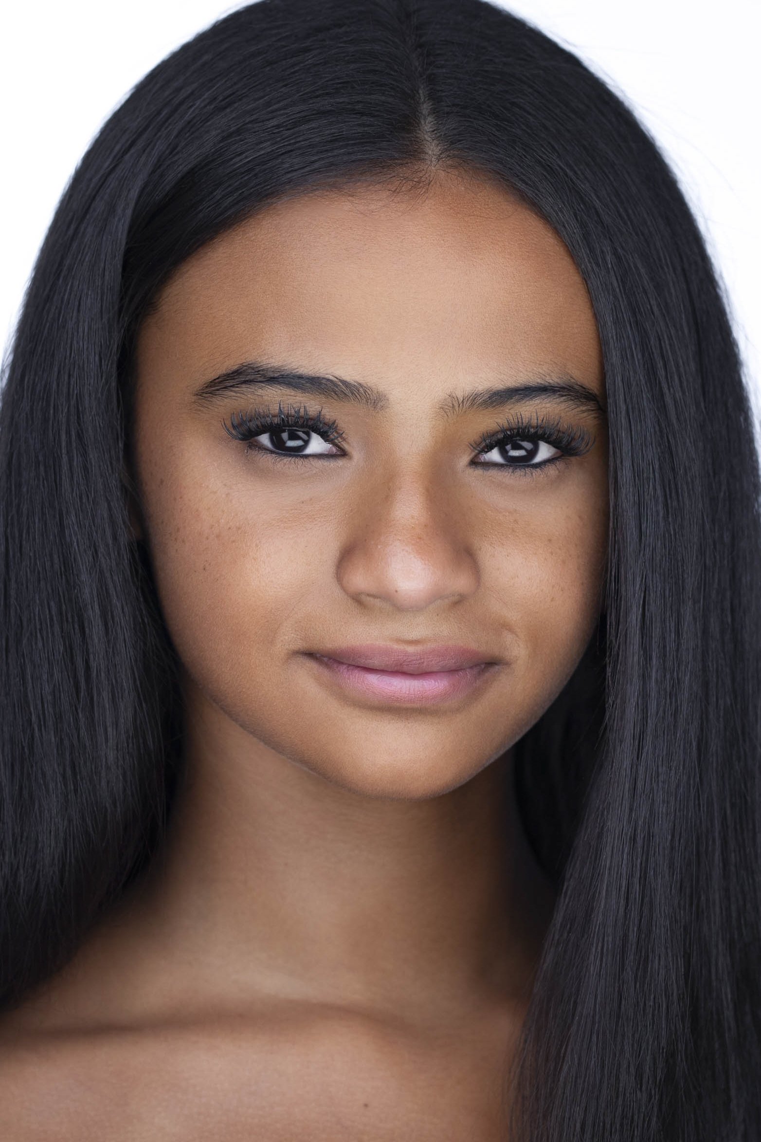 Modern acting headshot in Dallas TX with clean white background and polished styling, ideal for casting and building modeling portafolios.