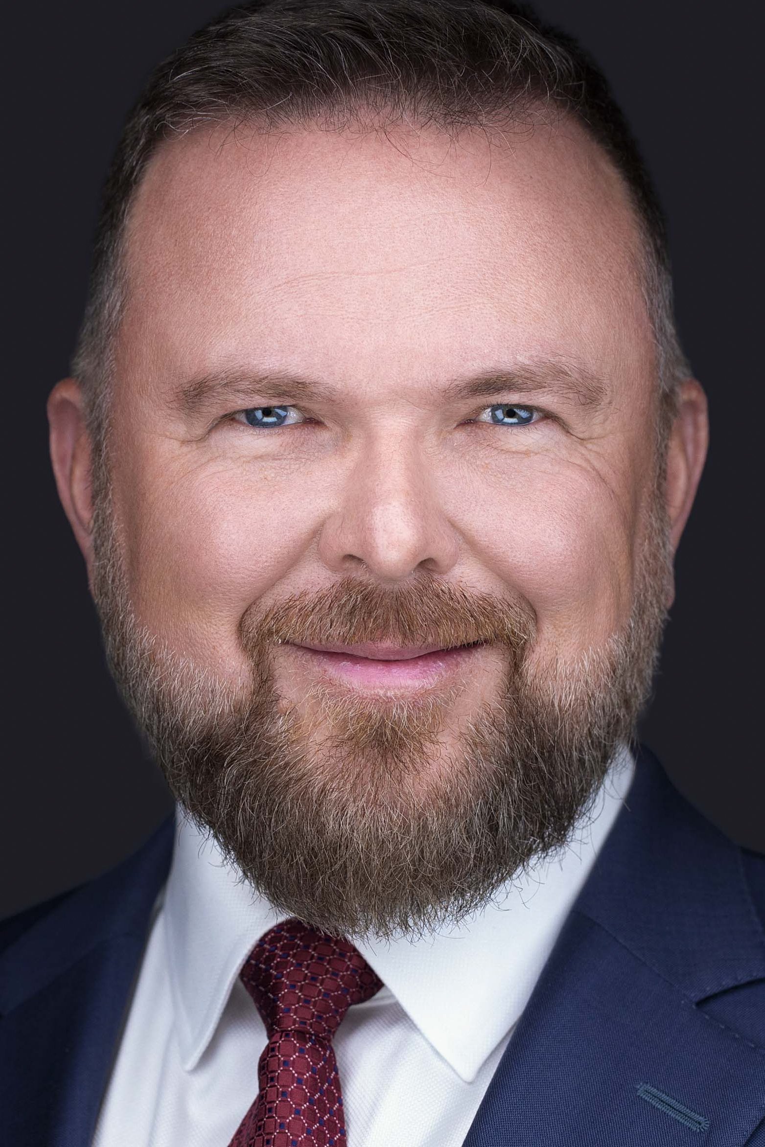 Corporate headshot in Dallas TX designed for C-suite professionals seeking a strong, approachable, and trustworthy presence.