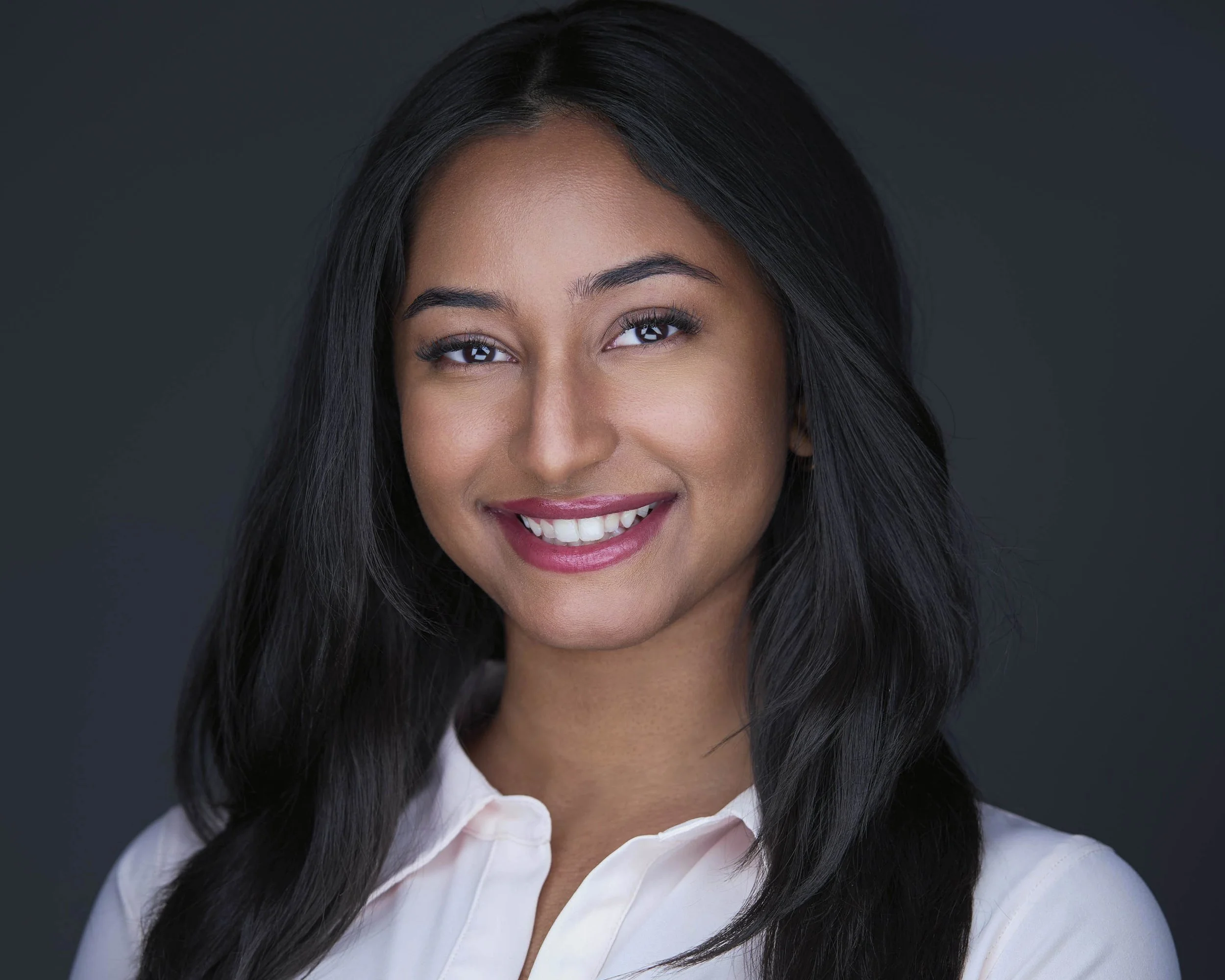 Professional headshot with natural expression coaching and modern style, Dallas headshot studio