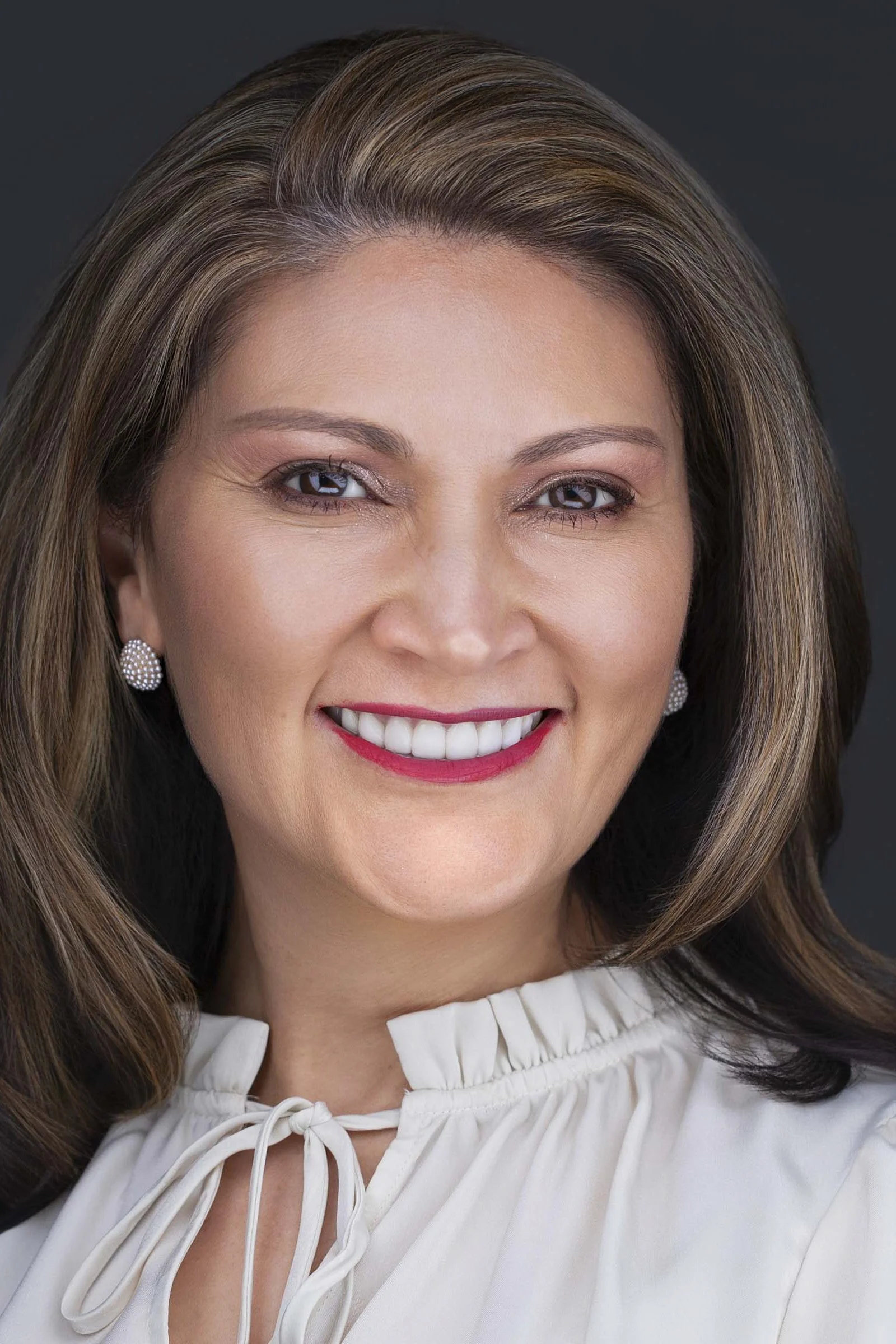 Professional headshot in Dallas TX crafted to highlight warmth and authority, perfect for executives and business leaders updating their personal brand.