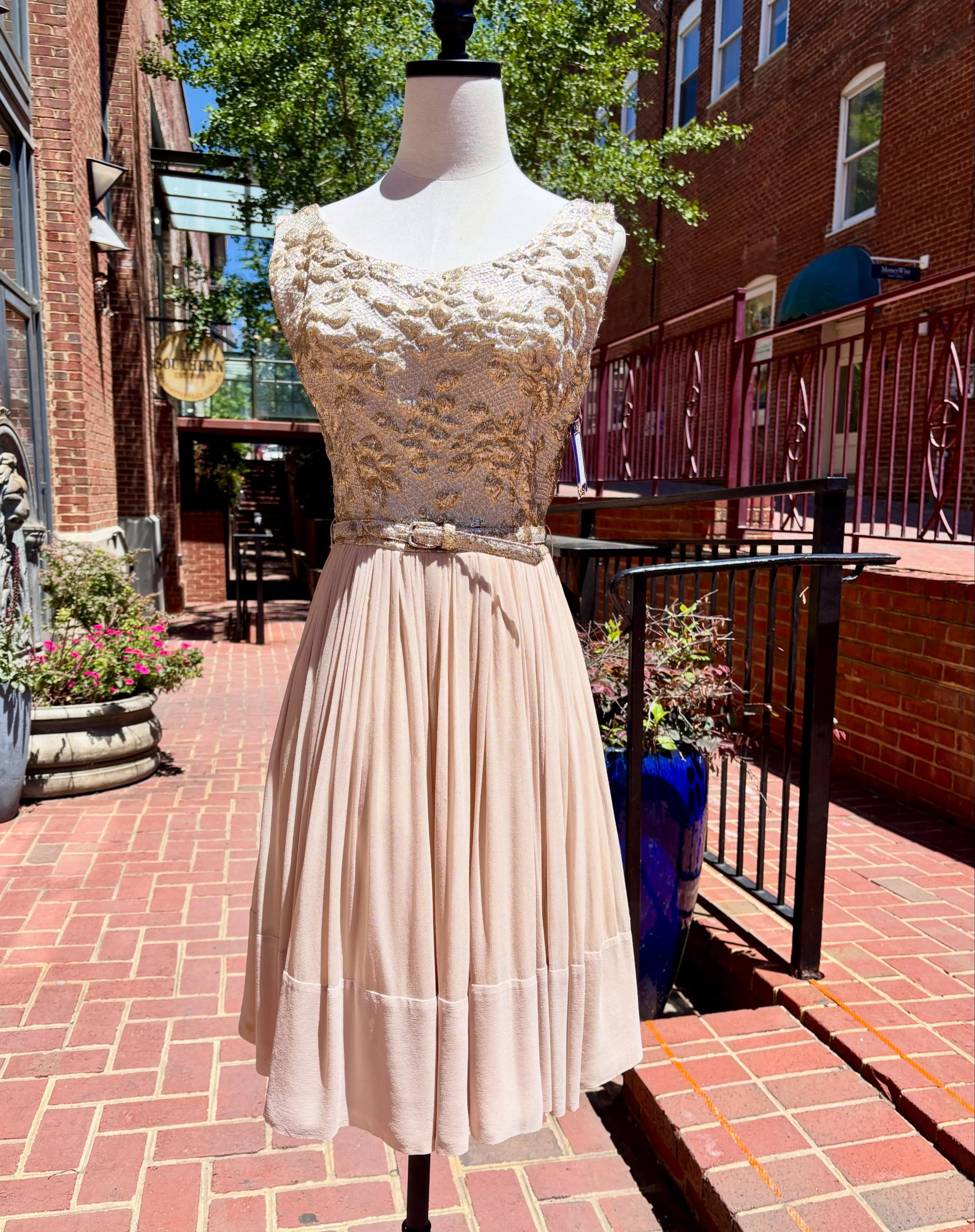 🥂🩰✨1950s Union Made Taupe Silk Chiffon Party Dress with a Lovely Gold Brocade Top!✨🩰🥂 
..
..
🏷️Size: 25&rdquo;W 
🏷️$75
..
..
..
..
#truevintage #1950svintage #1950sdress #partydress #shopvintagesavetheworld 
..
..
..
Shops of Downtown Charlotte