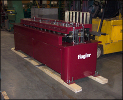 The NEW Flagler Model 1" Standing "S" features a powerful 7.5 HP motor & 1” cleat rolls. It’s built for speed & durability, perfect for any project.  Ideal for high-speed operations in any workshop.