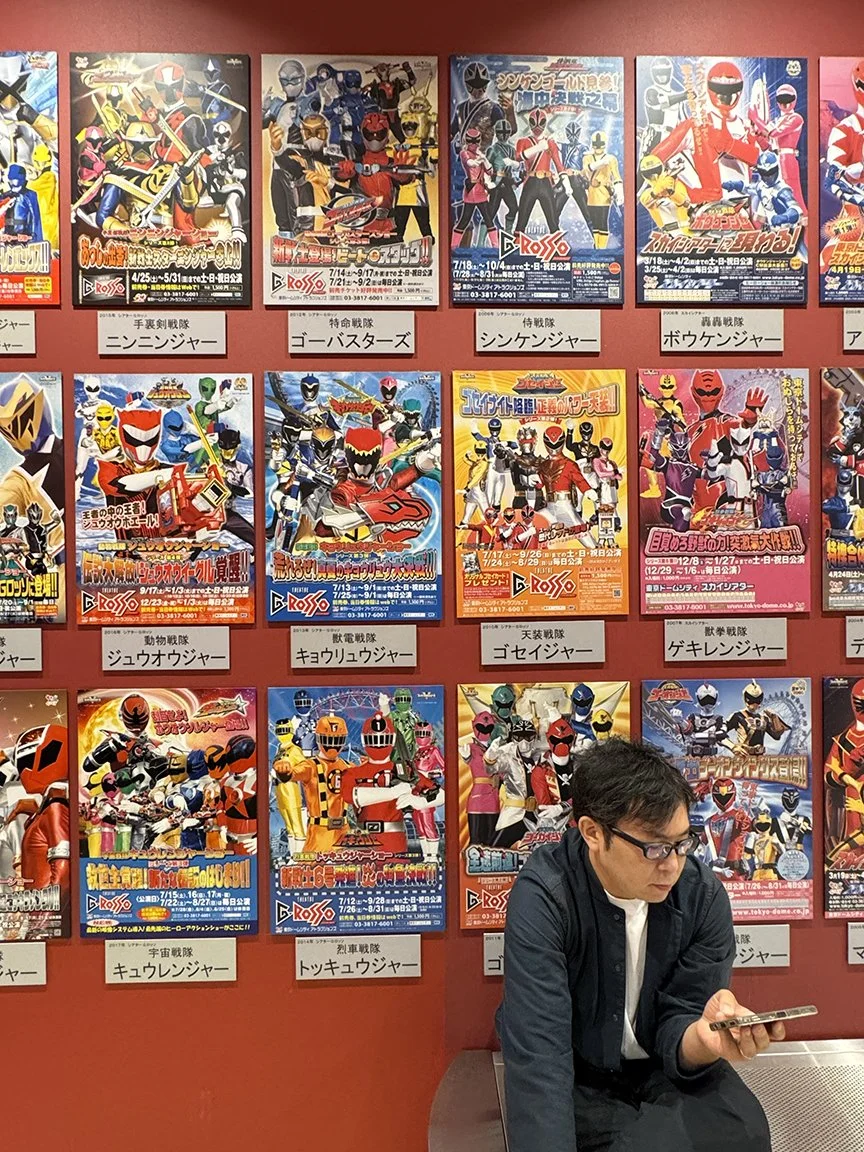 Man looking at phone, Roppongi, 2025