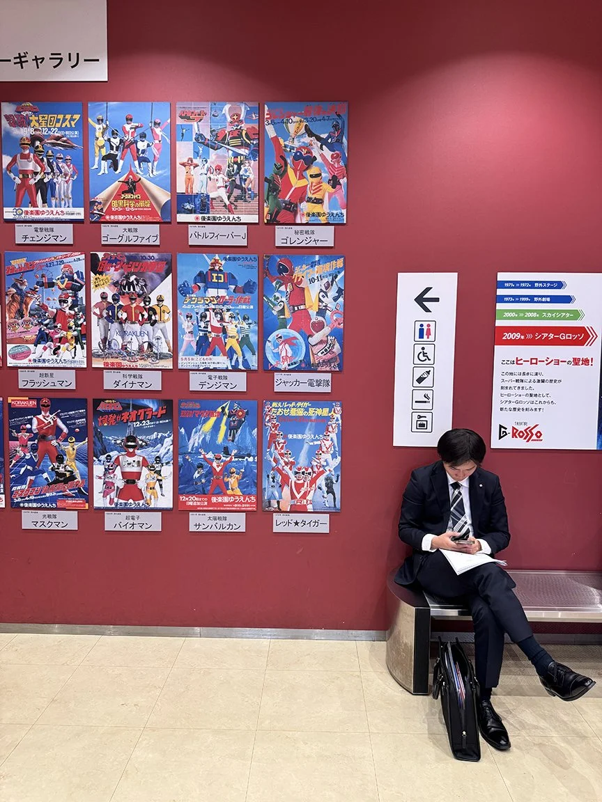 Man looking at phone, Meguro, 2025