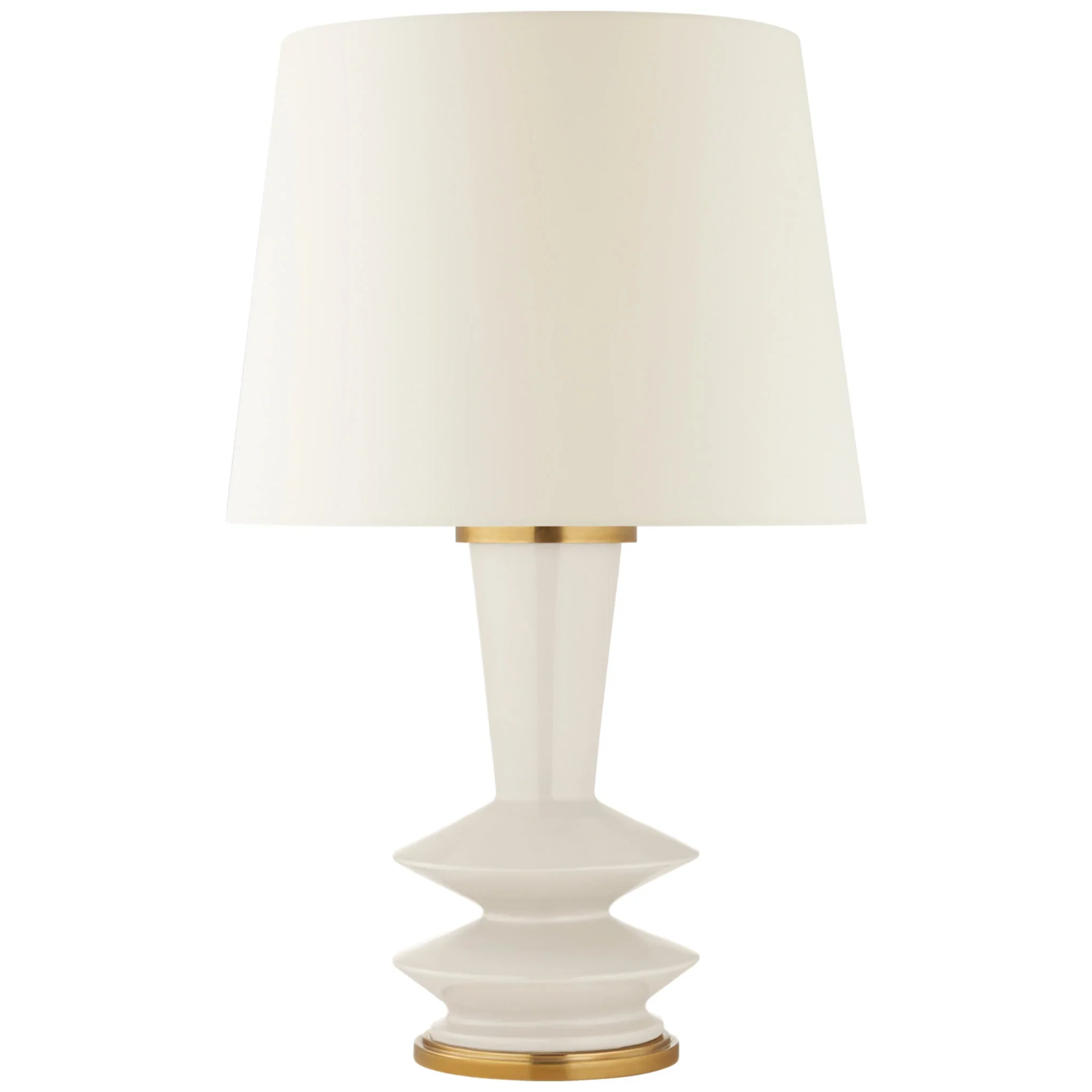 White table lamp with a cone-shaped shade and geometric base with gold accents.