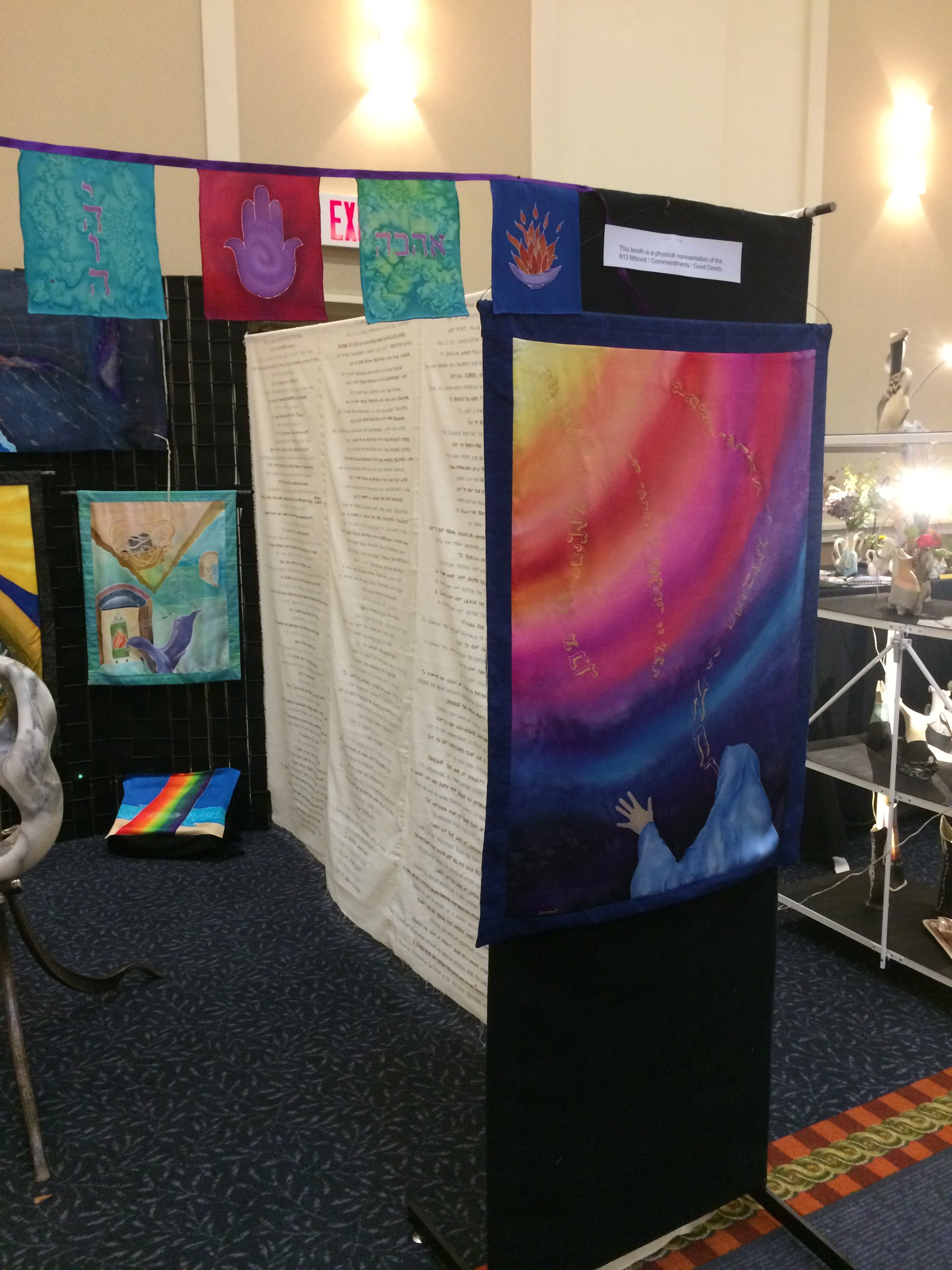 On the walls of the booth were the 613 Mitzvot written in English