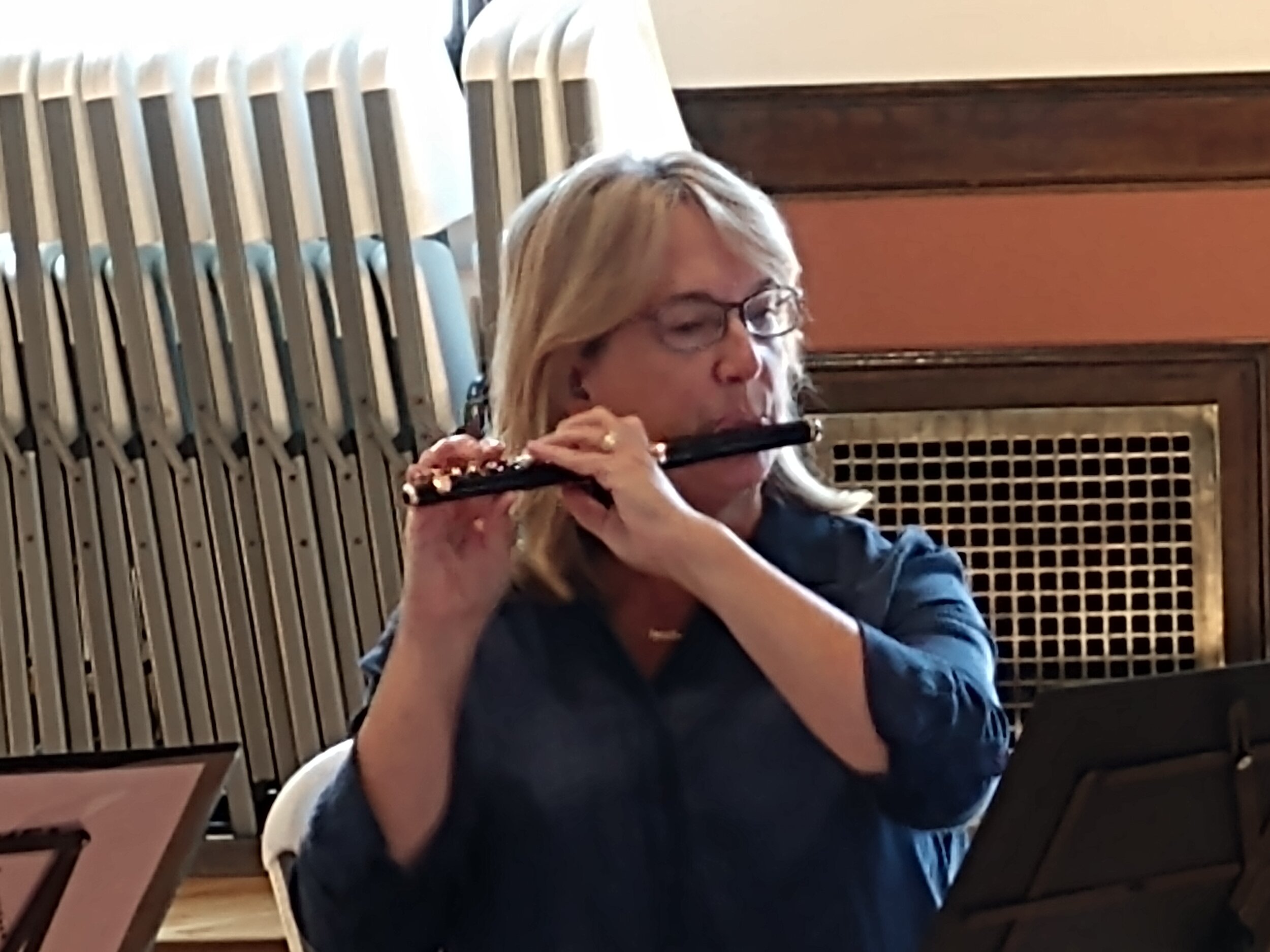 Member playing piccolo