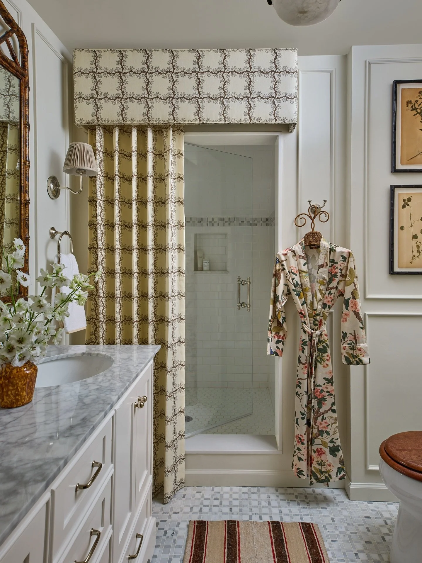 The primary bathroom is one of the smallest rooms in the house and the only one without natural light (swipe for before). The challenge was making this intimate space feel like a true ensuite that was far more substantial than its size.

I leaned int