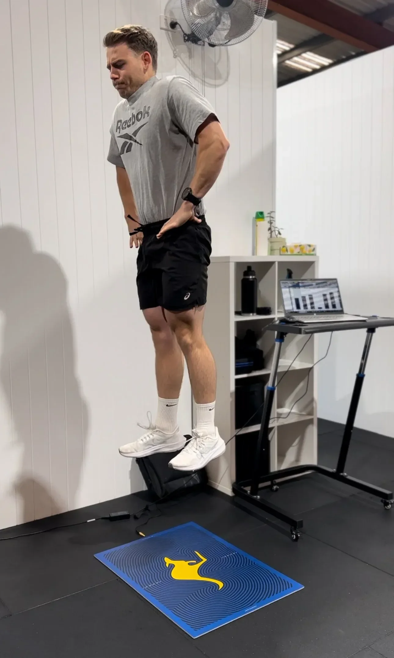 Man jumping on a jump mat strength and conditioning caringbah