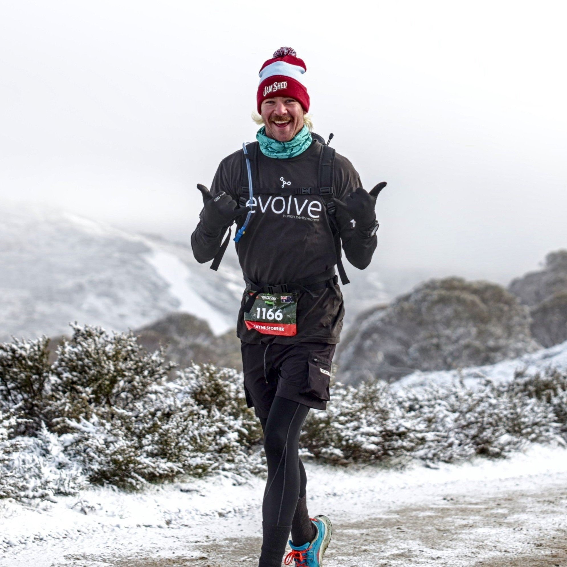 Layne running in snow potrait.jpg