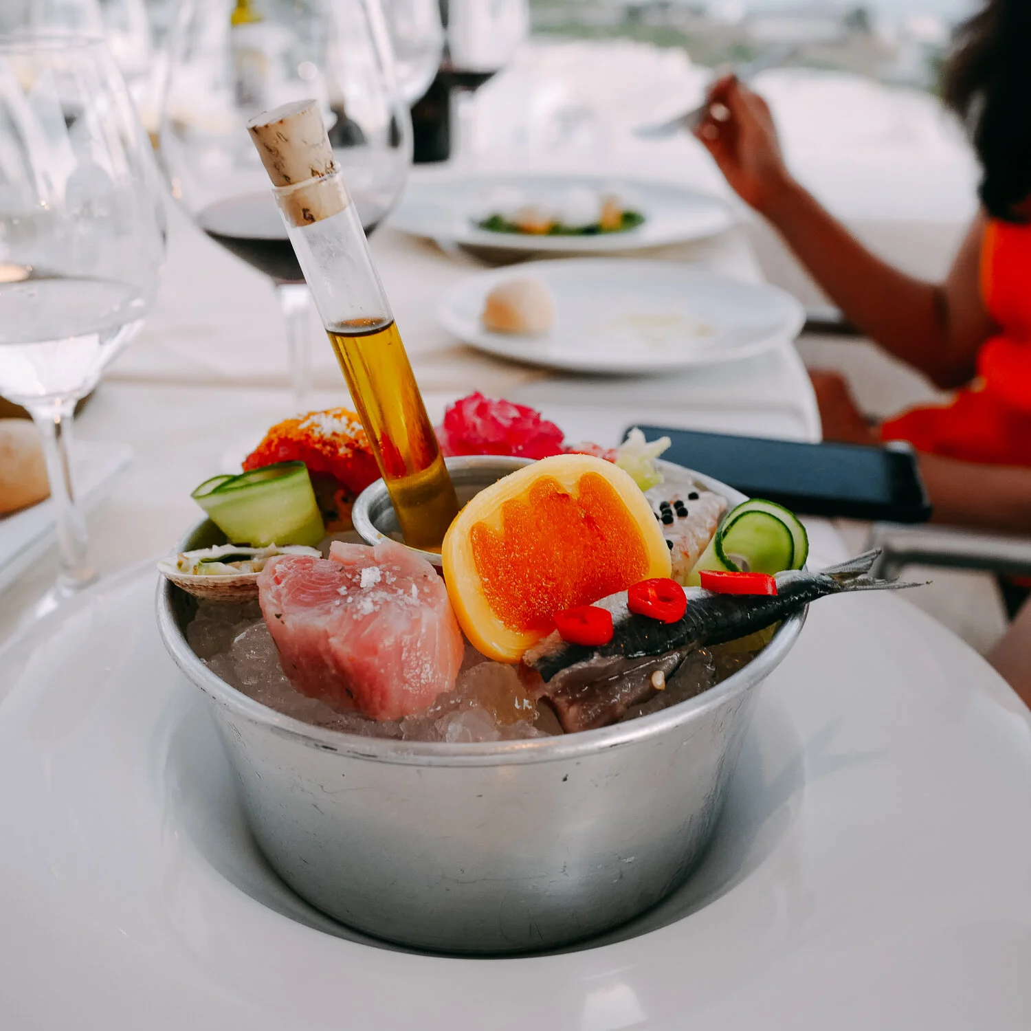 SEASCAPE. Sea urchin, clams, mussel with rice, shrimp, greek coffee scented botarga, dorado tartar, bonito, lettuce hearts.